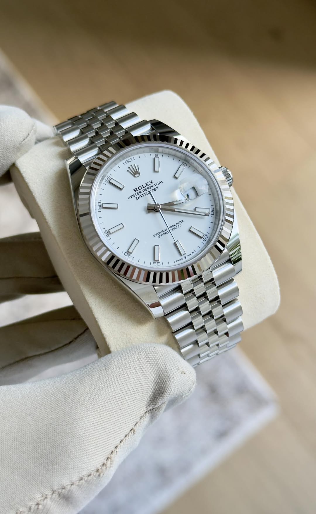 May be an image of wrist watch and text