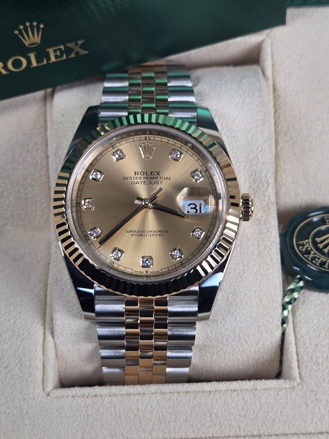 May be an image of wrist watch and text