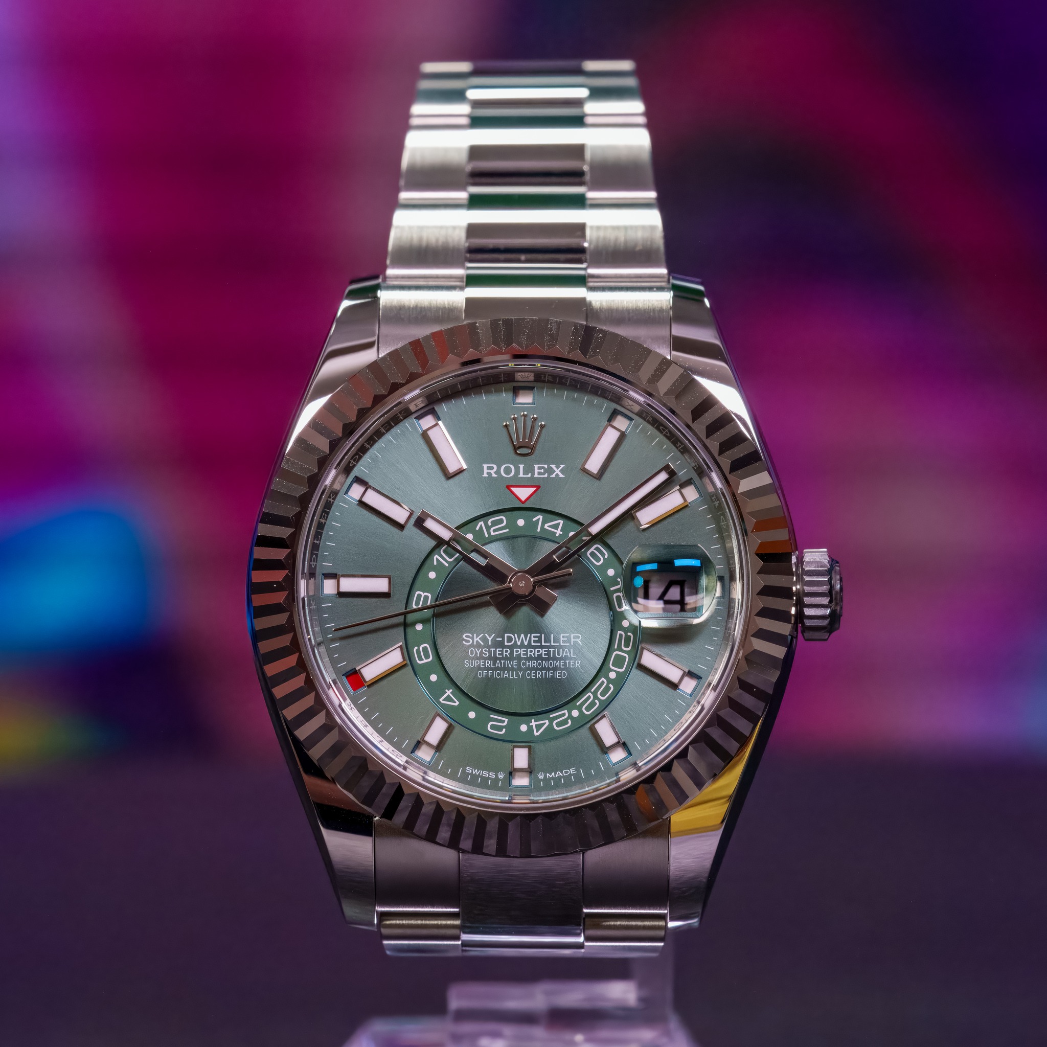 May be an image of wrist watch and text