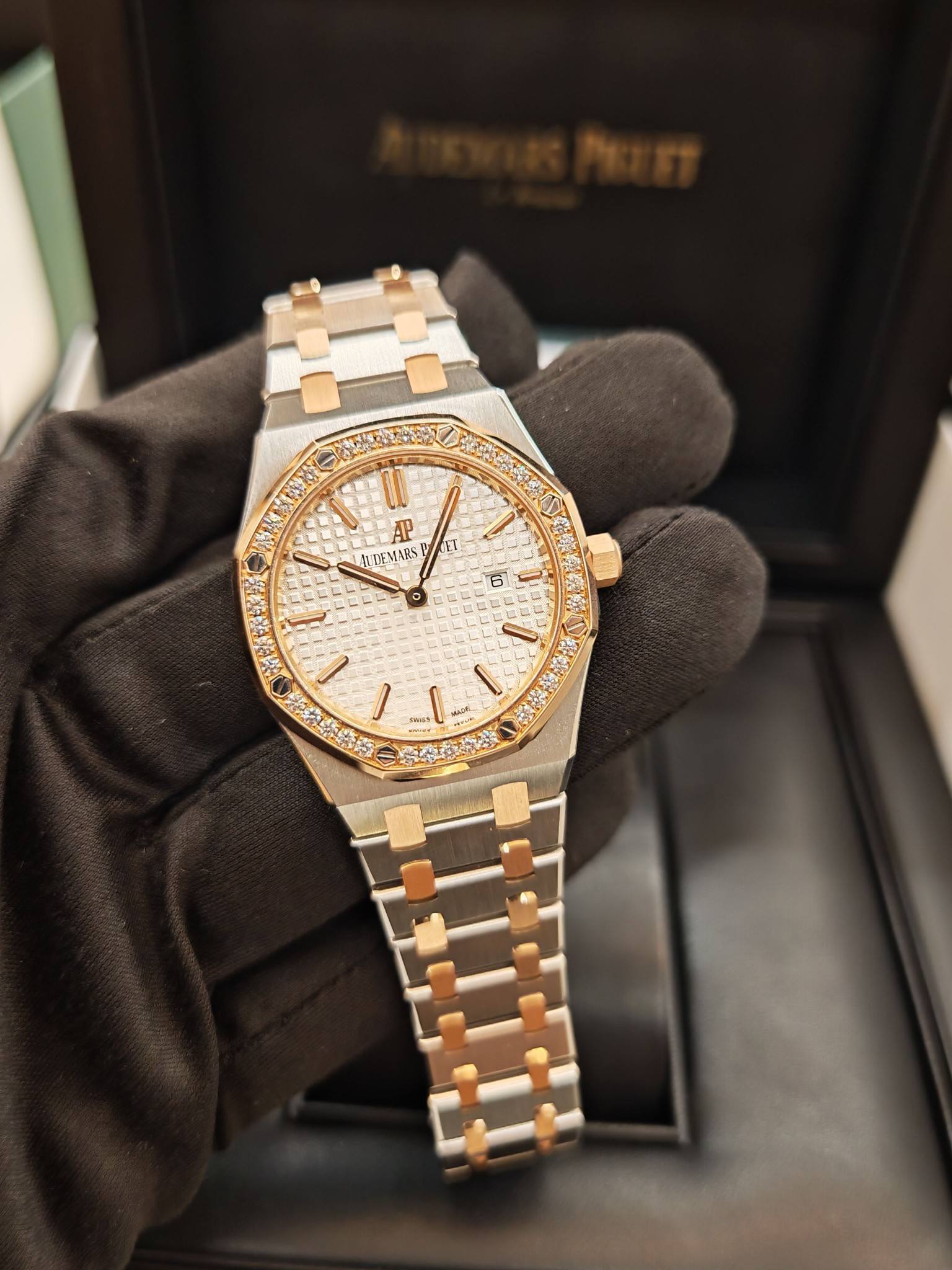 May be an image of wrist watch and text