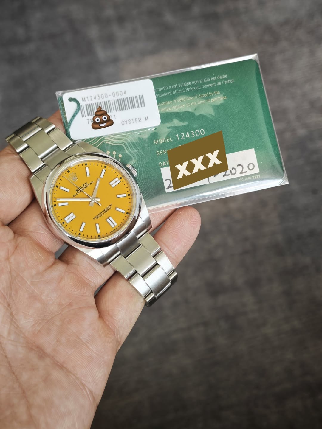May be an image of wrist watch and text
