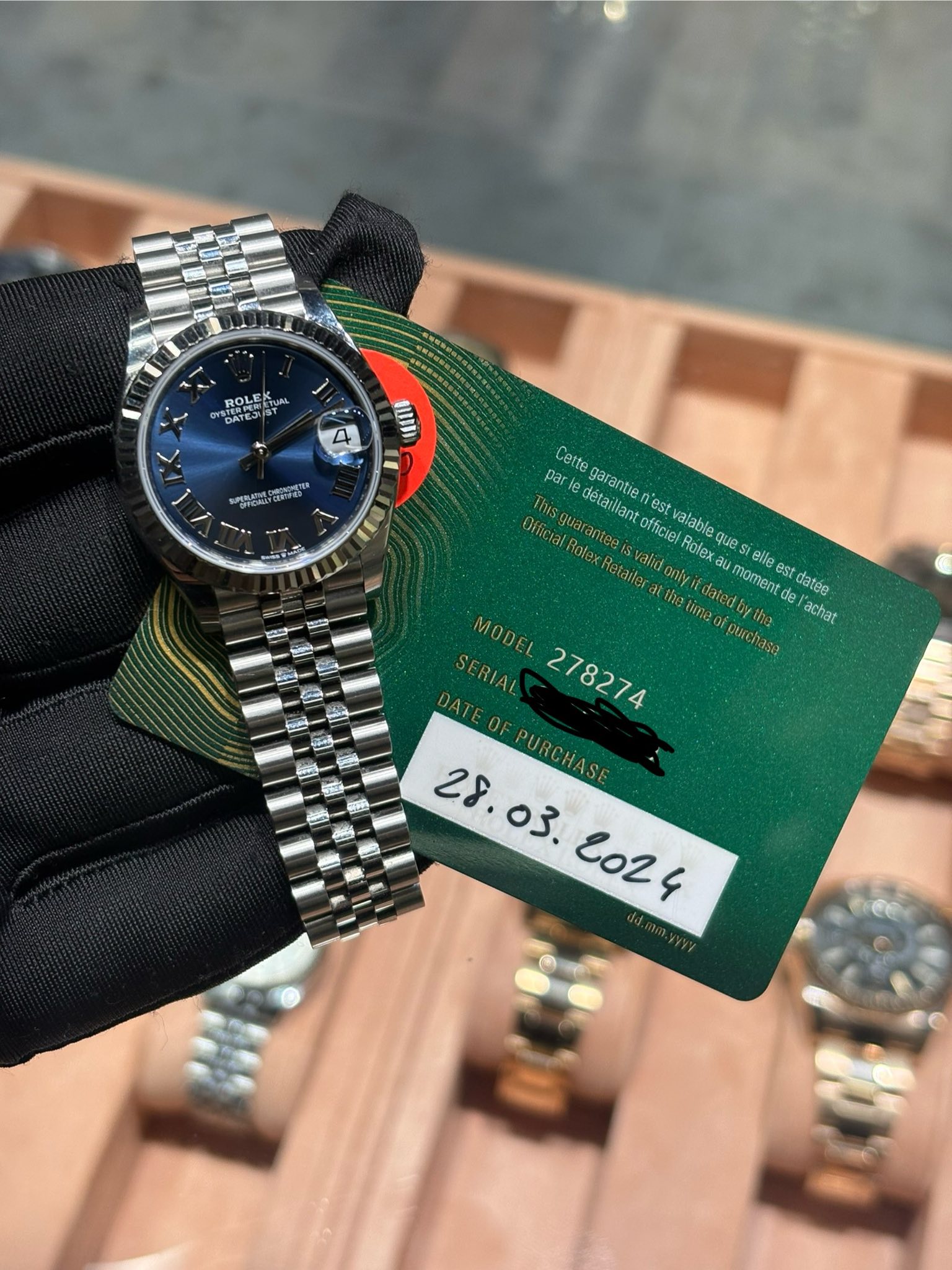 May be an image of wrist watch and text that says 'ROLE 用れ サTE X Oи የማስራባ SNS Ceite par garantie détaillant 'est OlfctalRot RolexRetailer alid onlyil moment eile est Offic JOus…