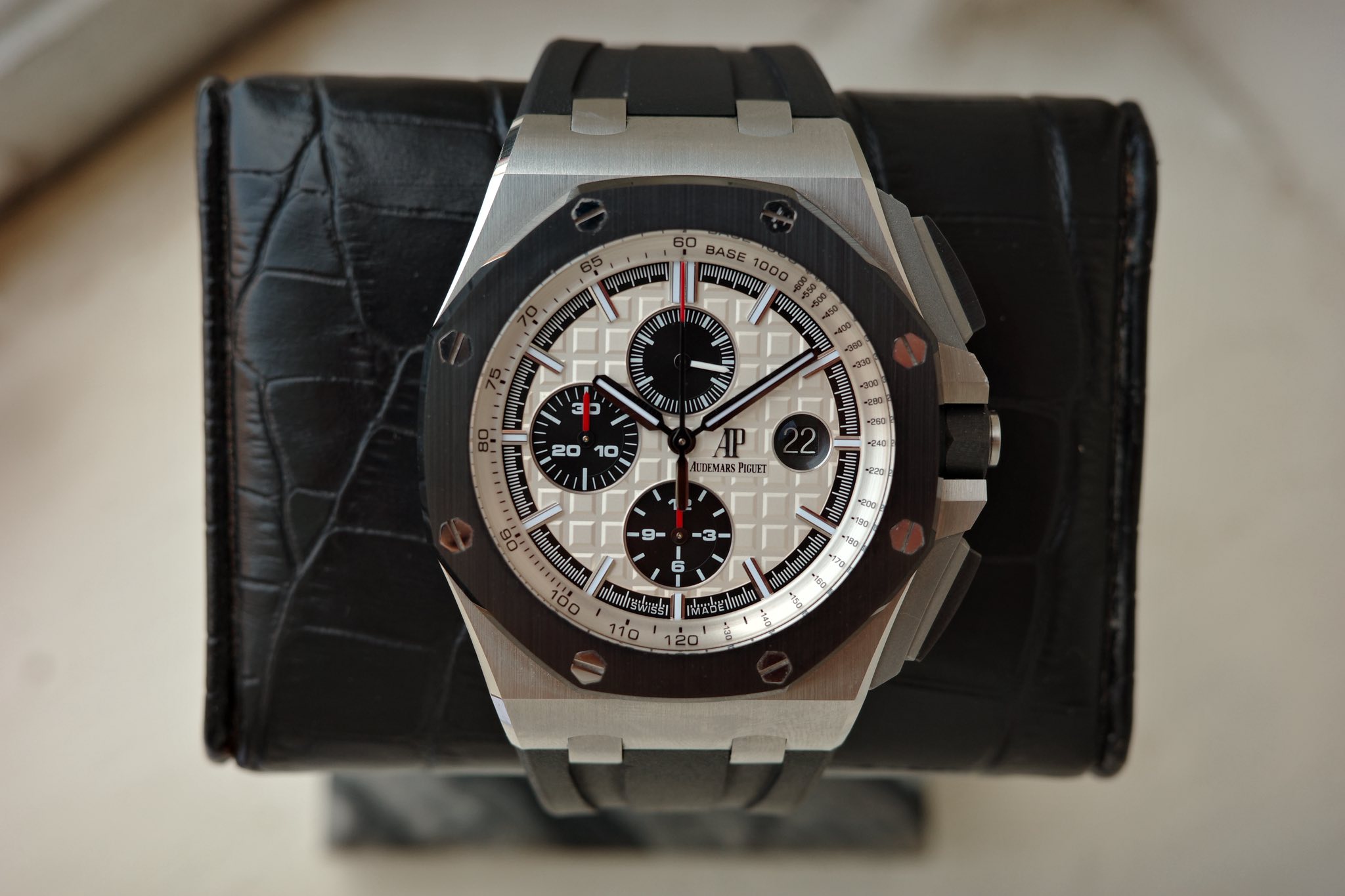 May be an image of wrist watch and text