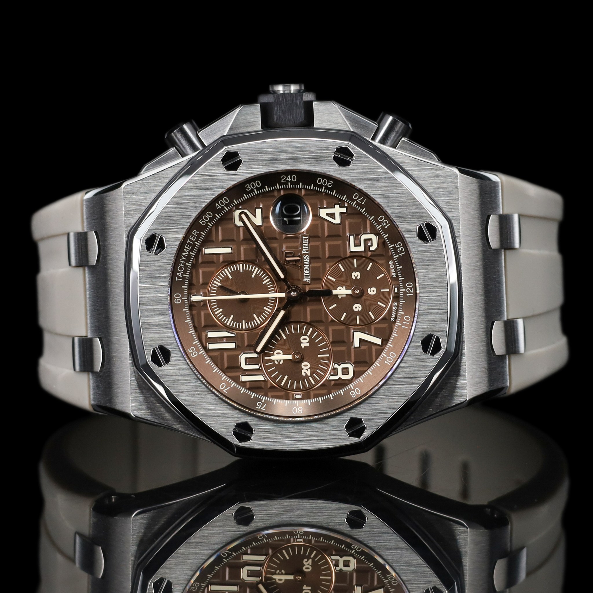 May be an image of wrist watch and text