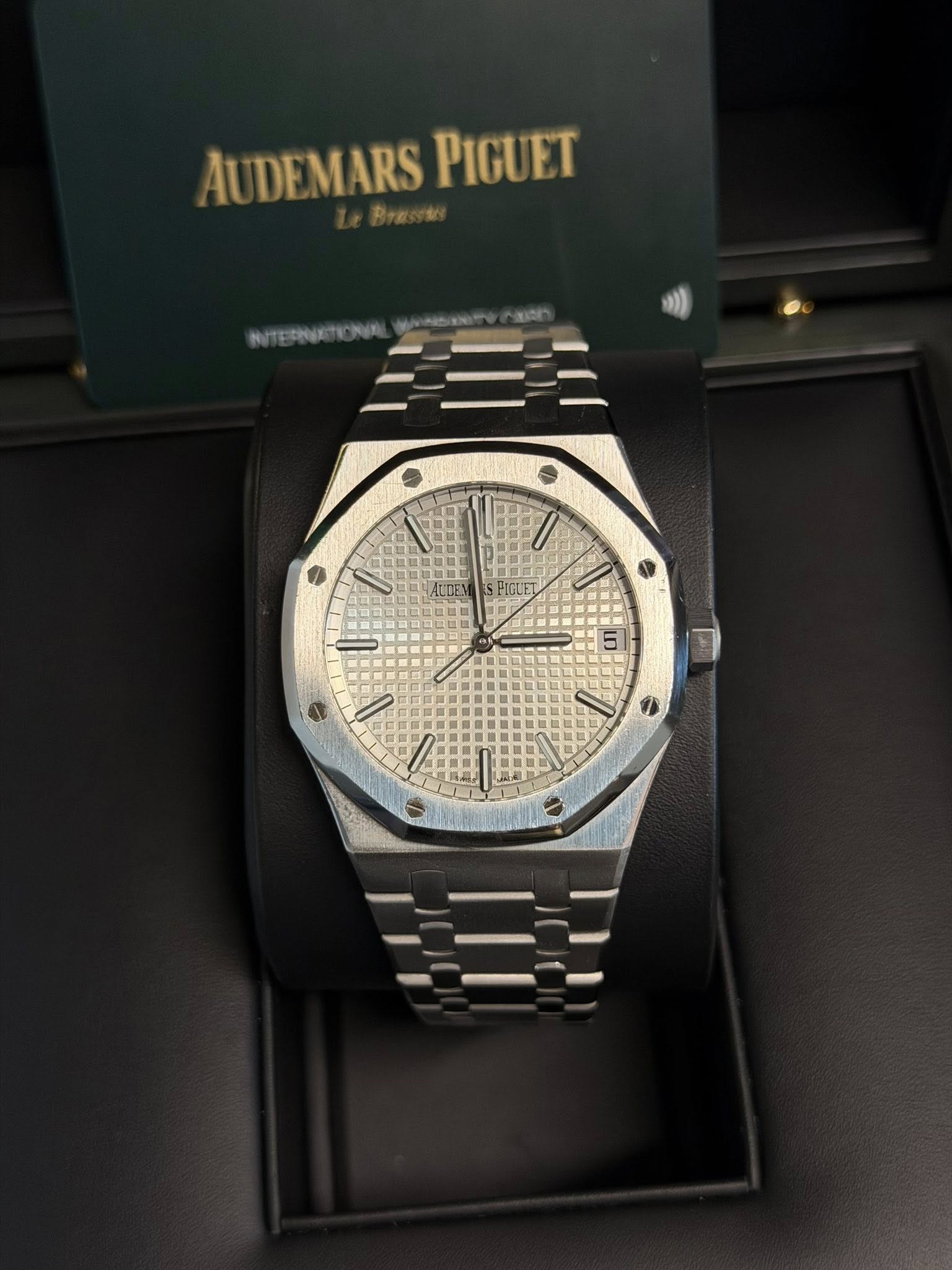 May be an image of wrist watch and text
