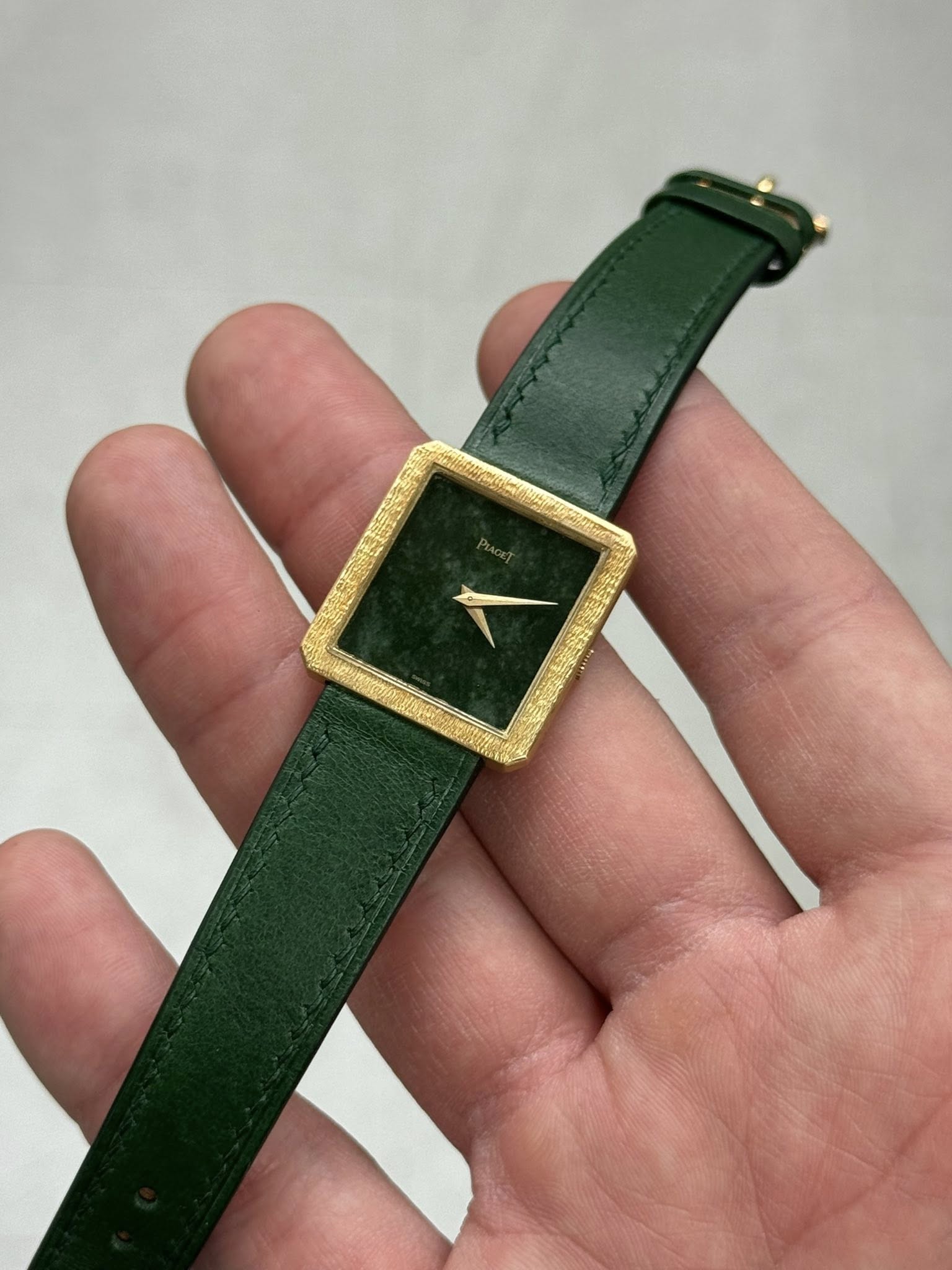 May be an image of wrist watch