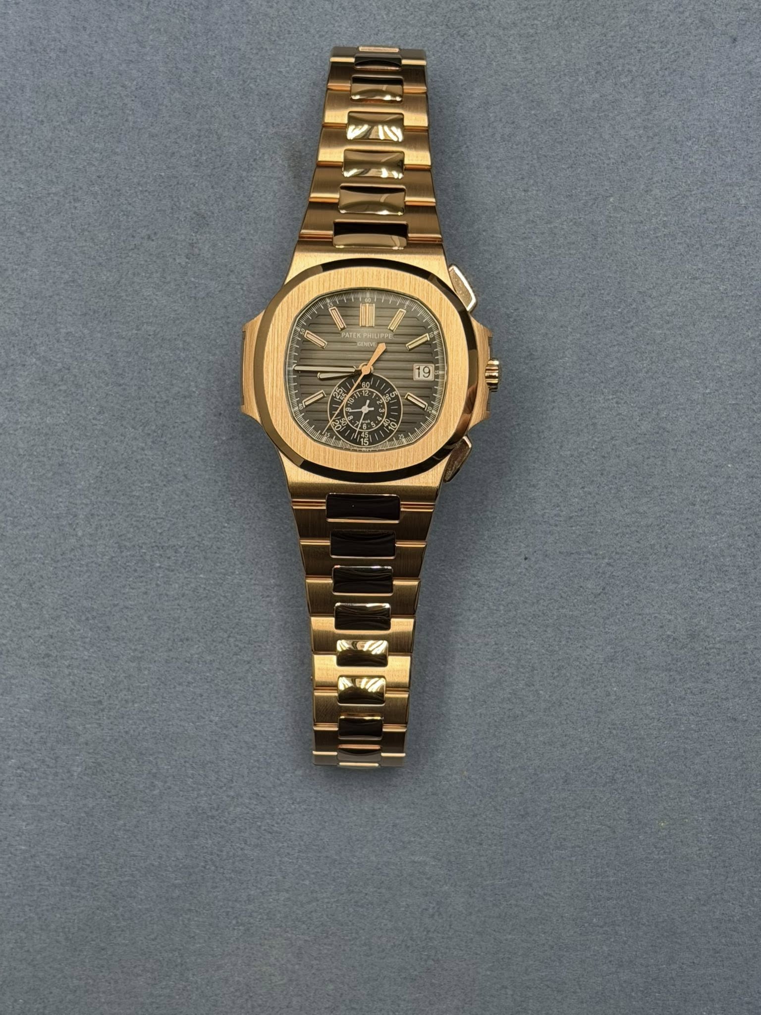 May be an image of wrist watch and text