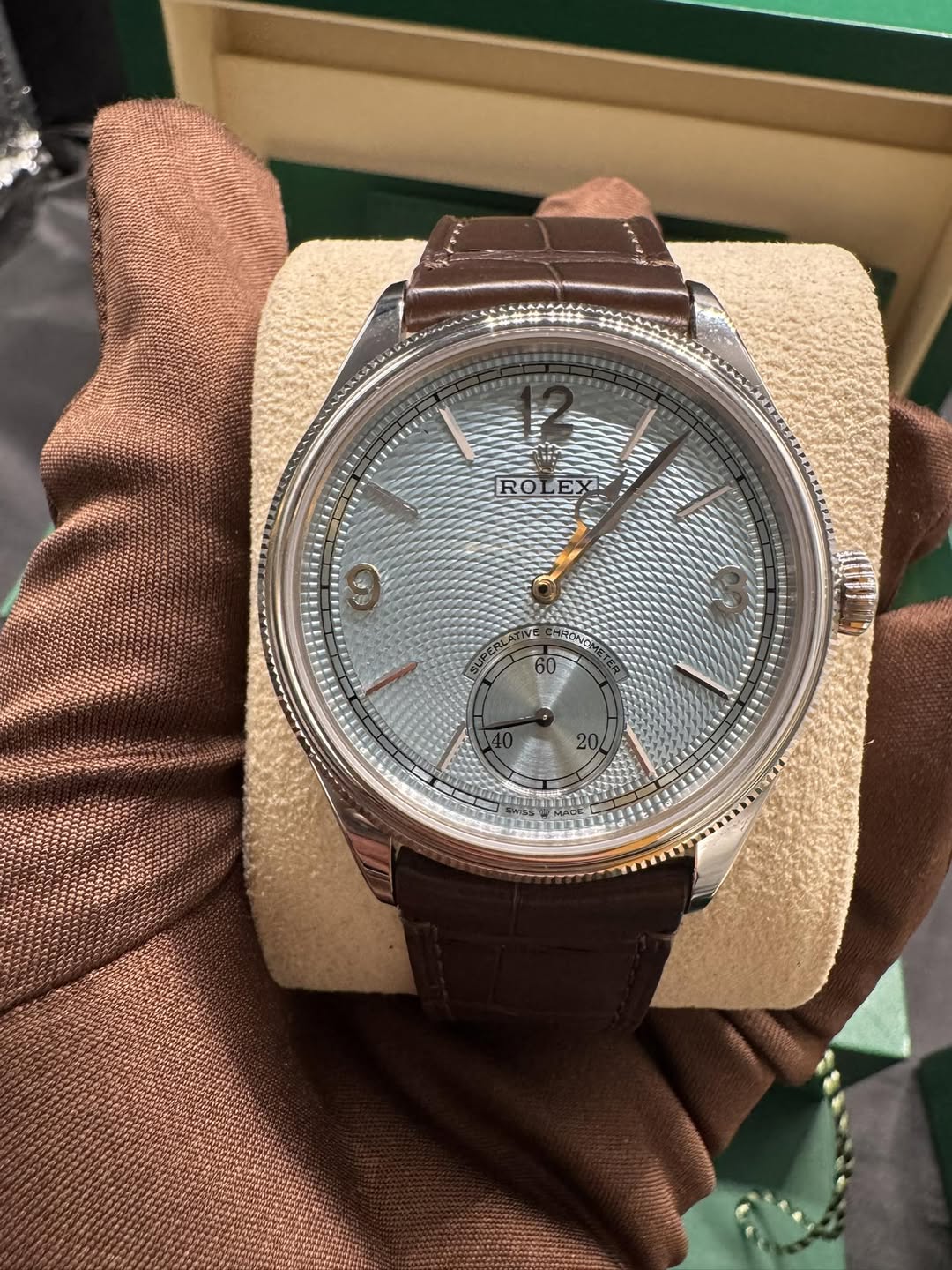May be an image of wrist watch and text