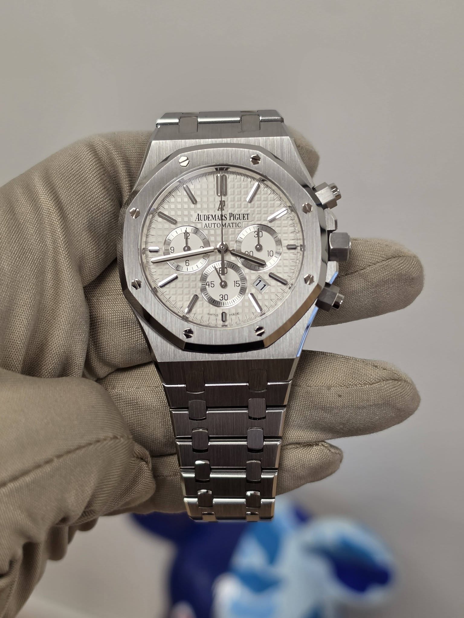 May be an image of wrist watch and text that says 'AUDEMAL PIGUEI ΑυΤΟΜΤΙ ATICE ATO 9 6 4 M0 '