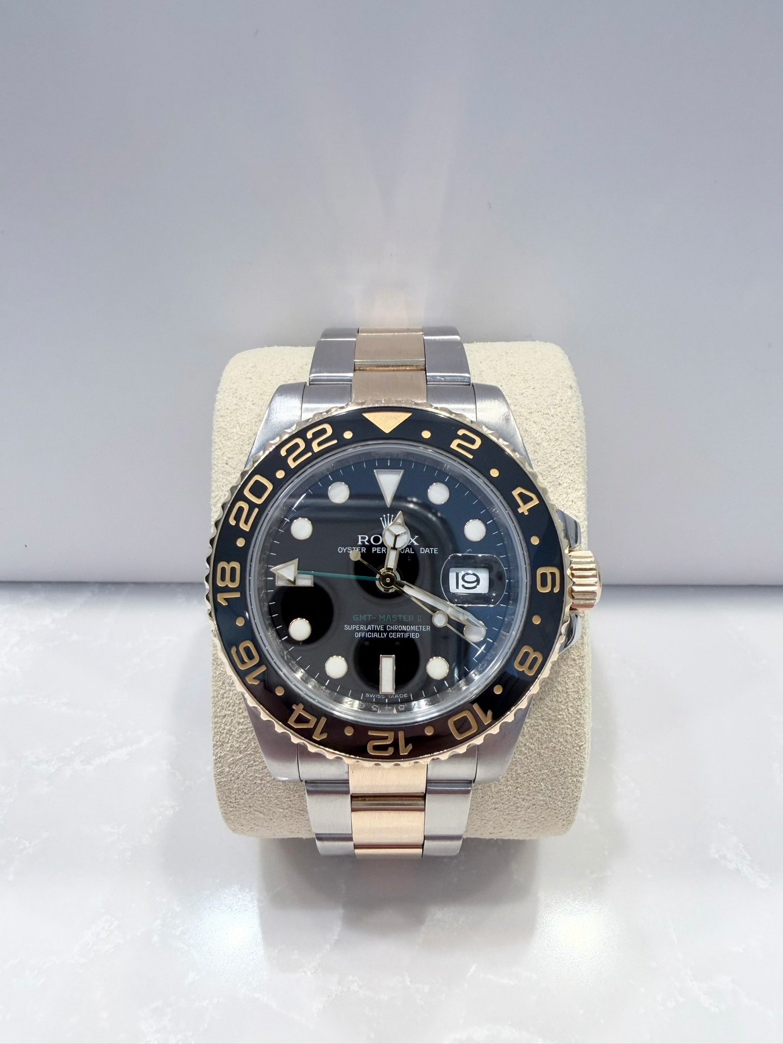 May be an image of wrist watch and text