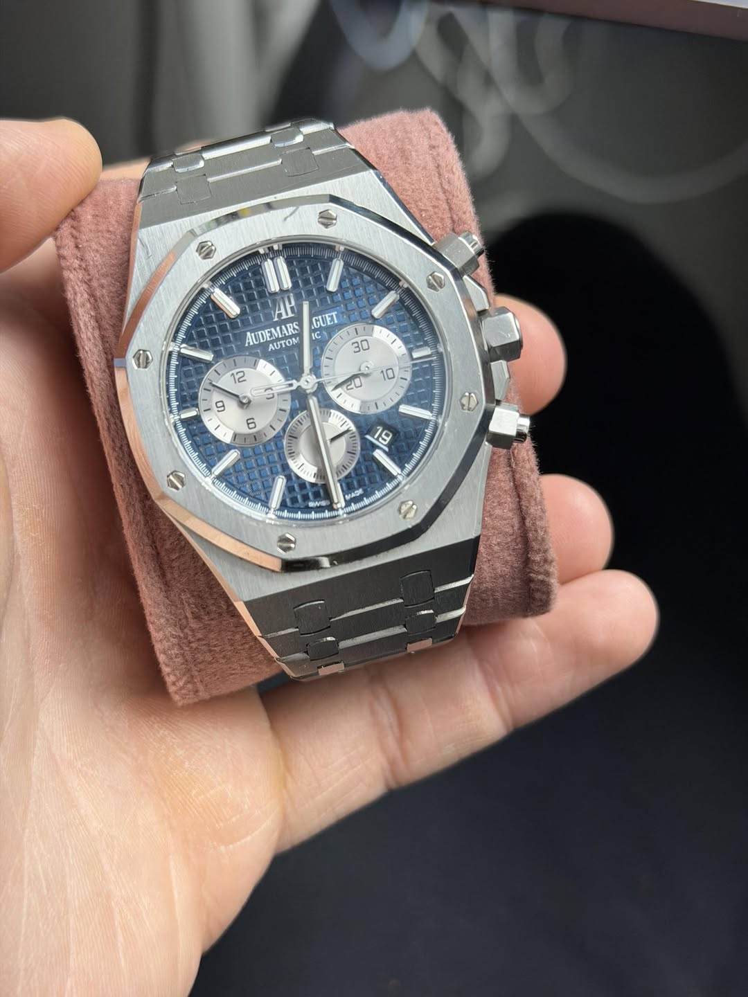 May be an image of wrist watch and text