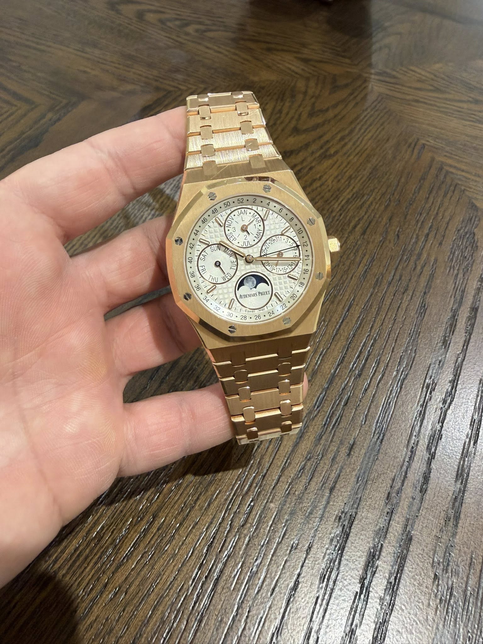 May be an image of wrist watch and text