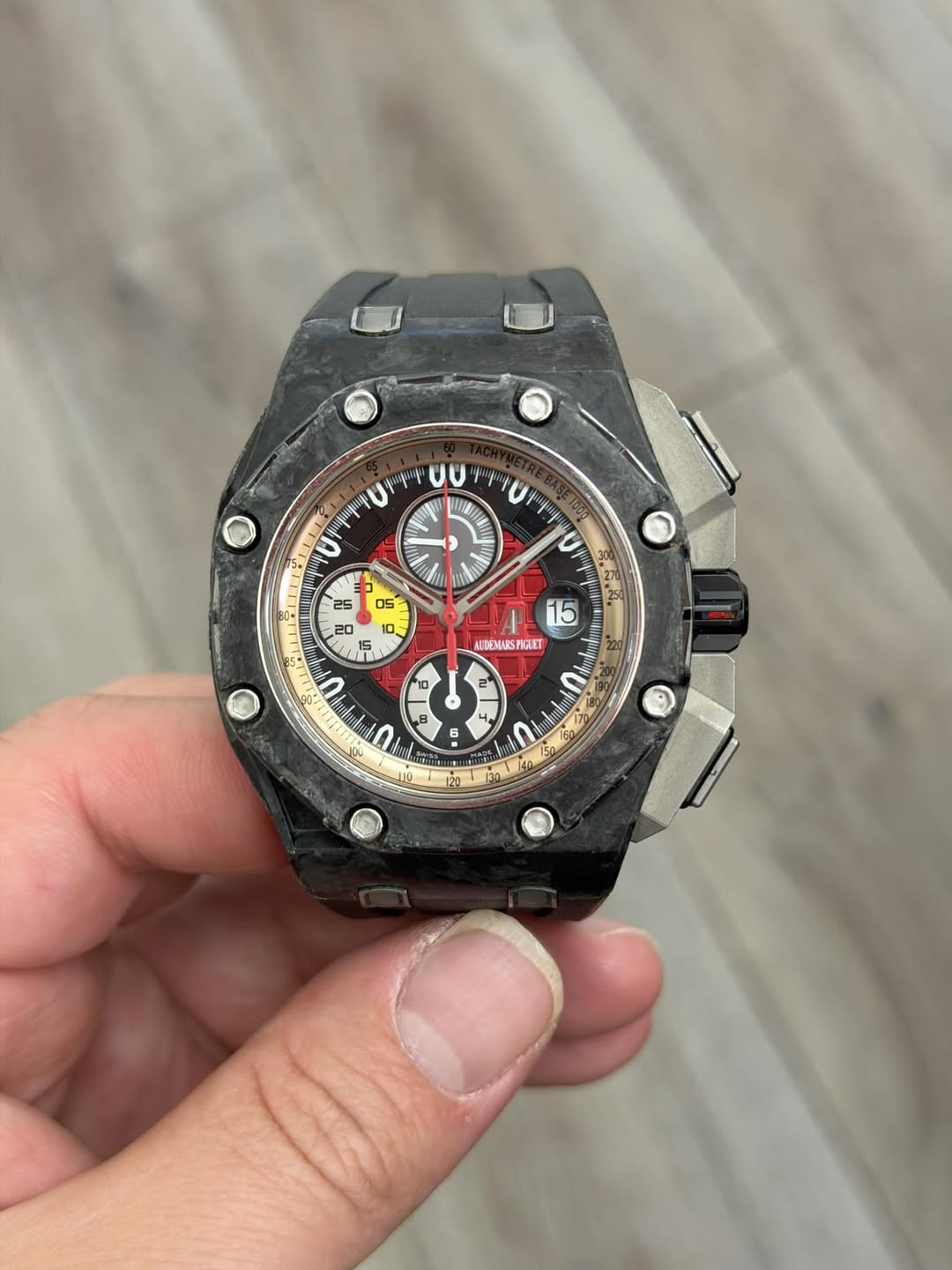 May be an image of wrist watch and text