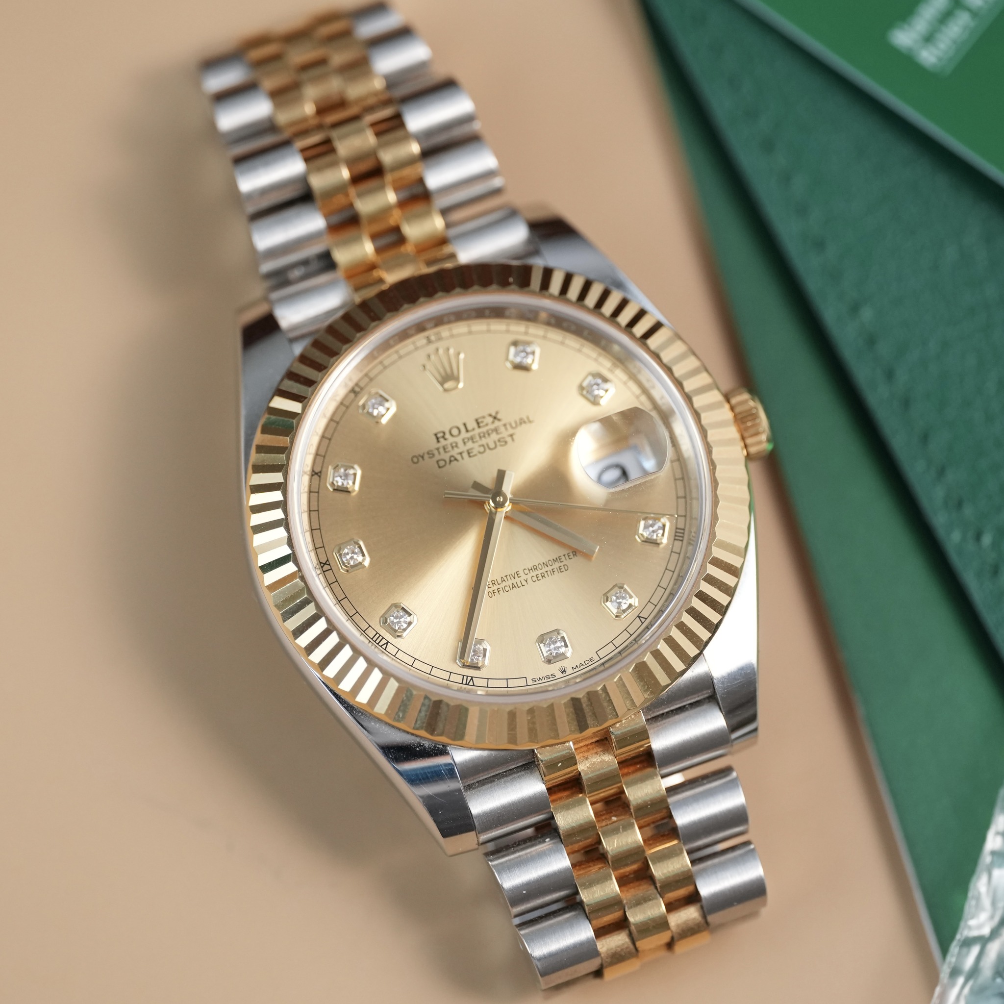 May be an image of wrist watch and text