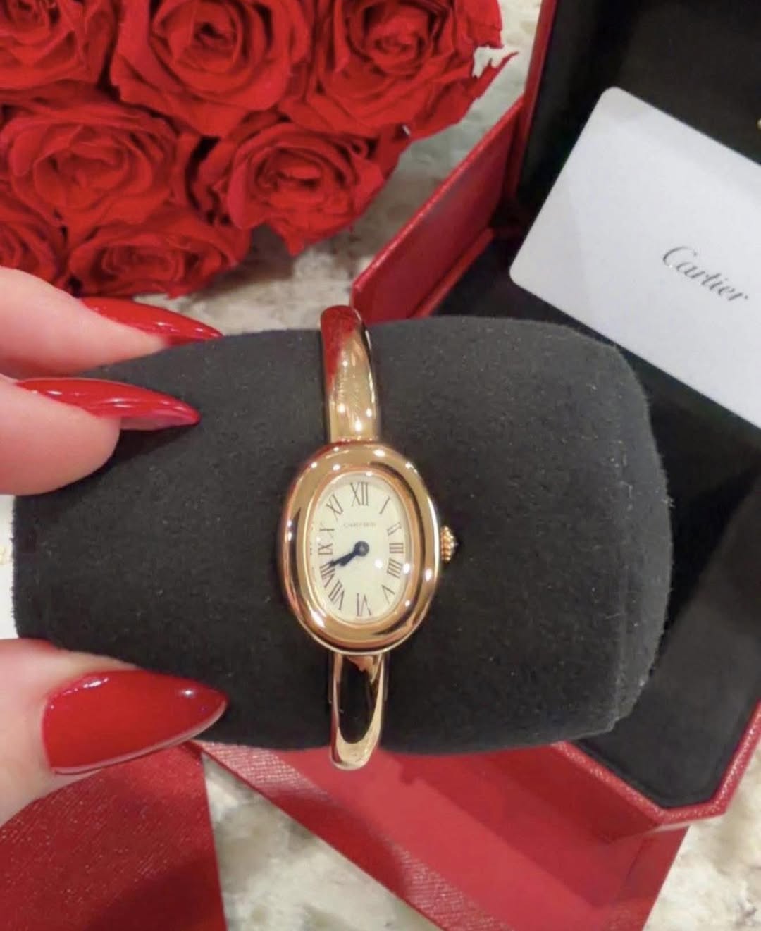 May be an image of wrist watch and text