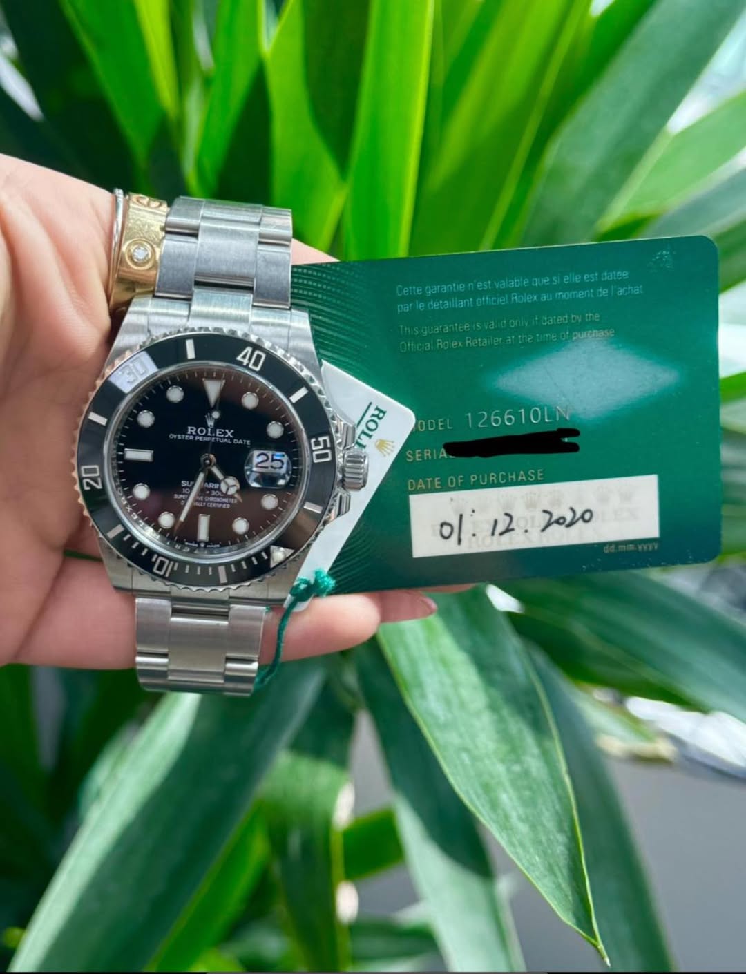 May be an image of wrist watch and text