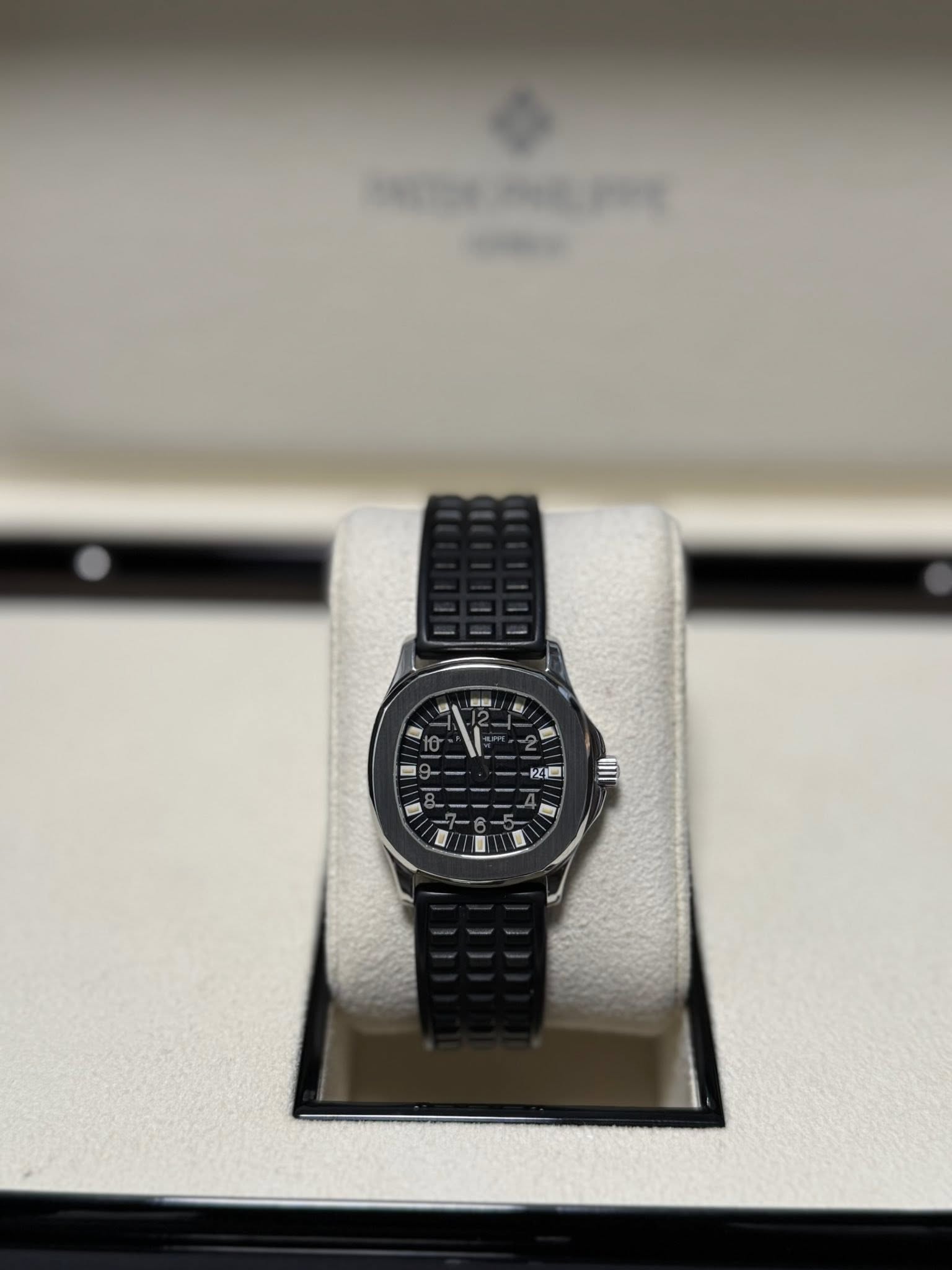 May be an image of wrist watch and text
