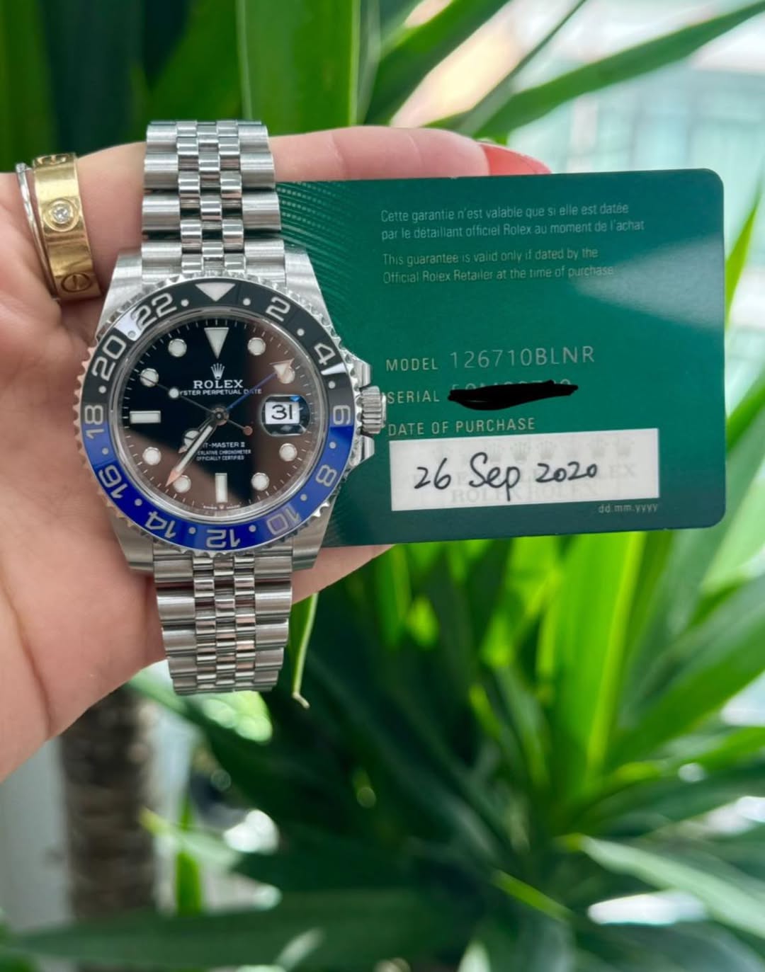 May be an image of wrist watch and text