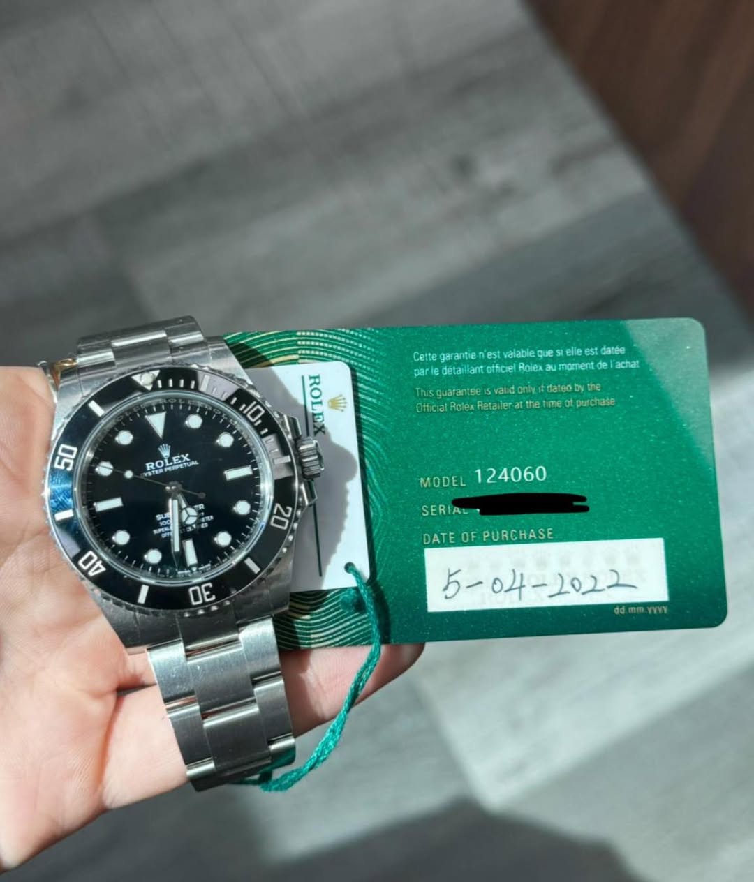 May be an image of wrist watch and text