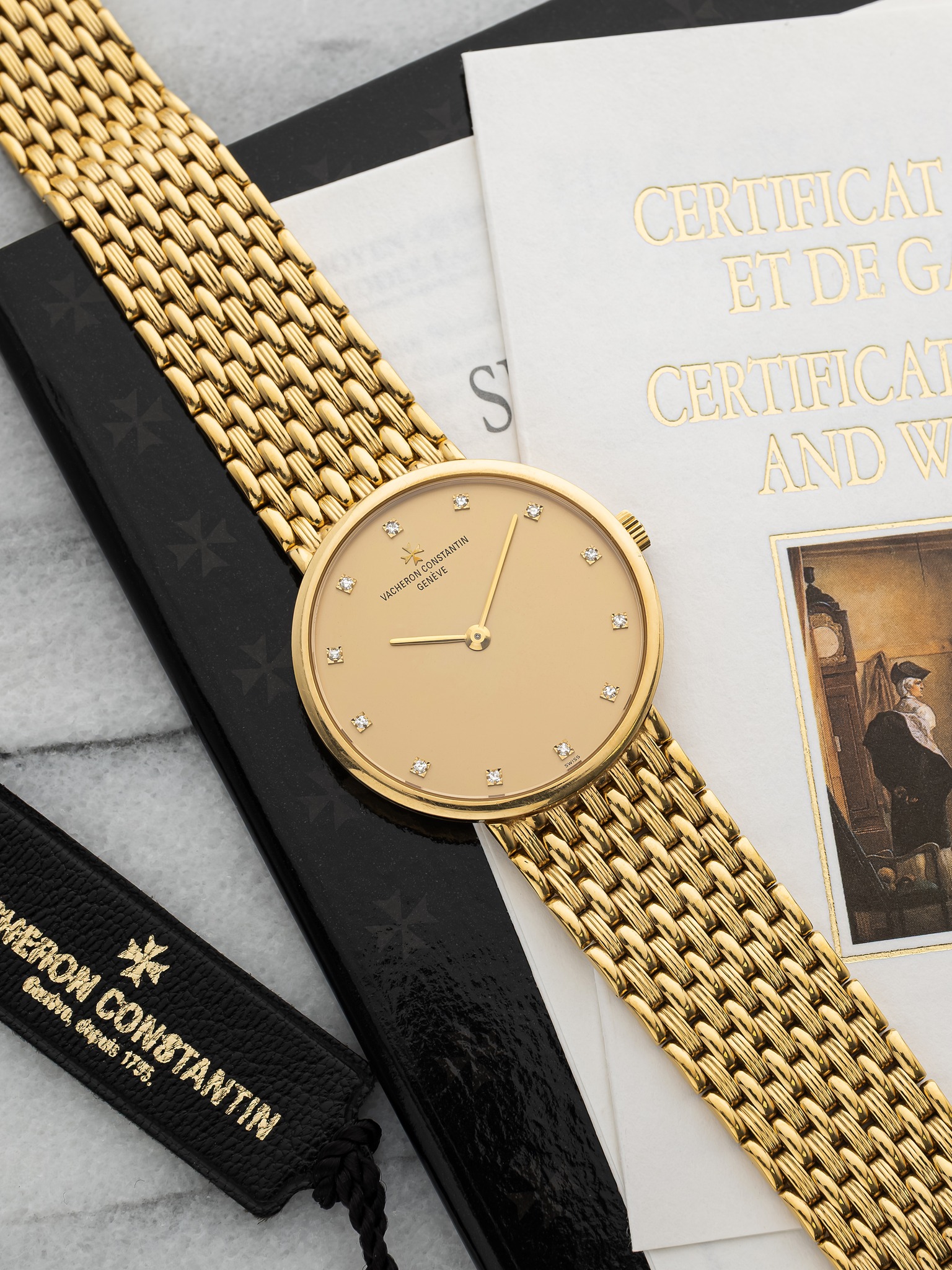 May be an image of wrist watch and text