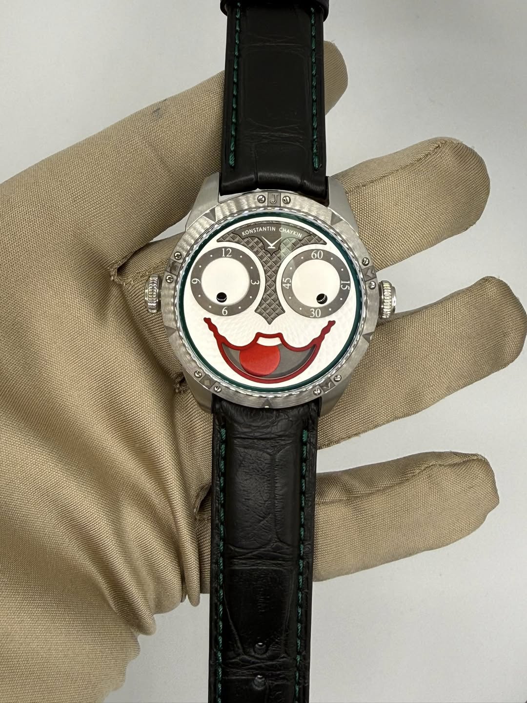 May be an image of wrist watch and text