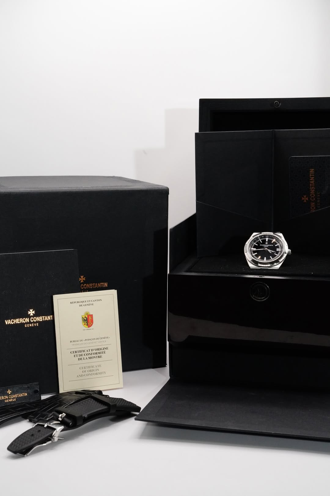May be an image of cufflinks, wrist watch, fragrance and text