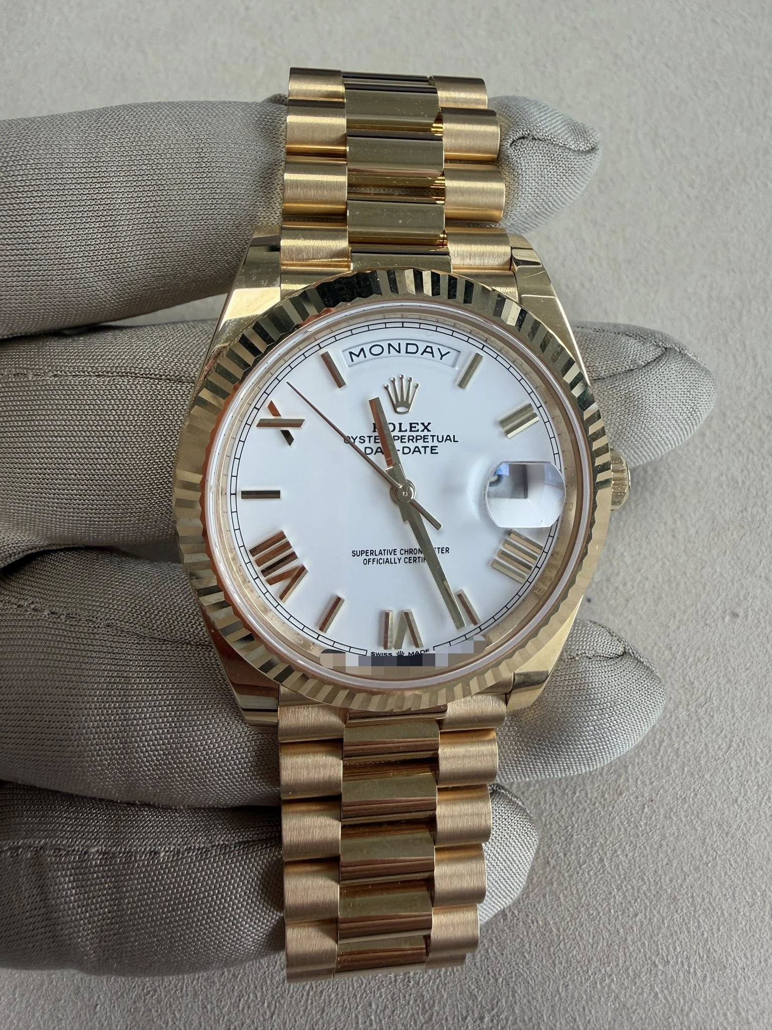 May be an image of wrist watch and text