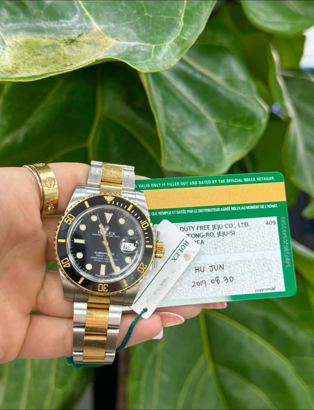 May be an image of wrist watch, ticket stub and text that says 'VALID ONLY FILLED OUT ND DATED THE OFFICIAL ROLEX RETAILER. 50 UEREMPLIEET DATEE ARU DISTRIBUTE 10 DYSTER AGREE…