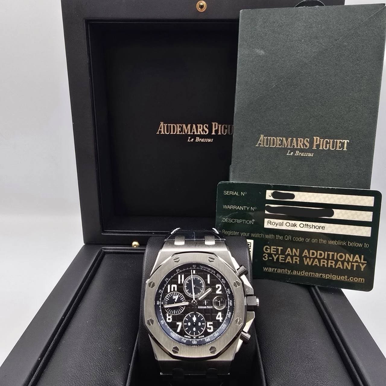 May be an image of wrist watch and text that says 'AUDEMARS PIC L Britssws AUDEMARSPIGUET Le Brassss AUDEMARS PIGUET SERIAL WARR WARRANTY N DESCRIPT Royal Oak Offshore و I n n 2…