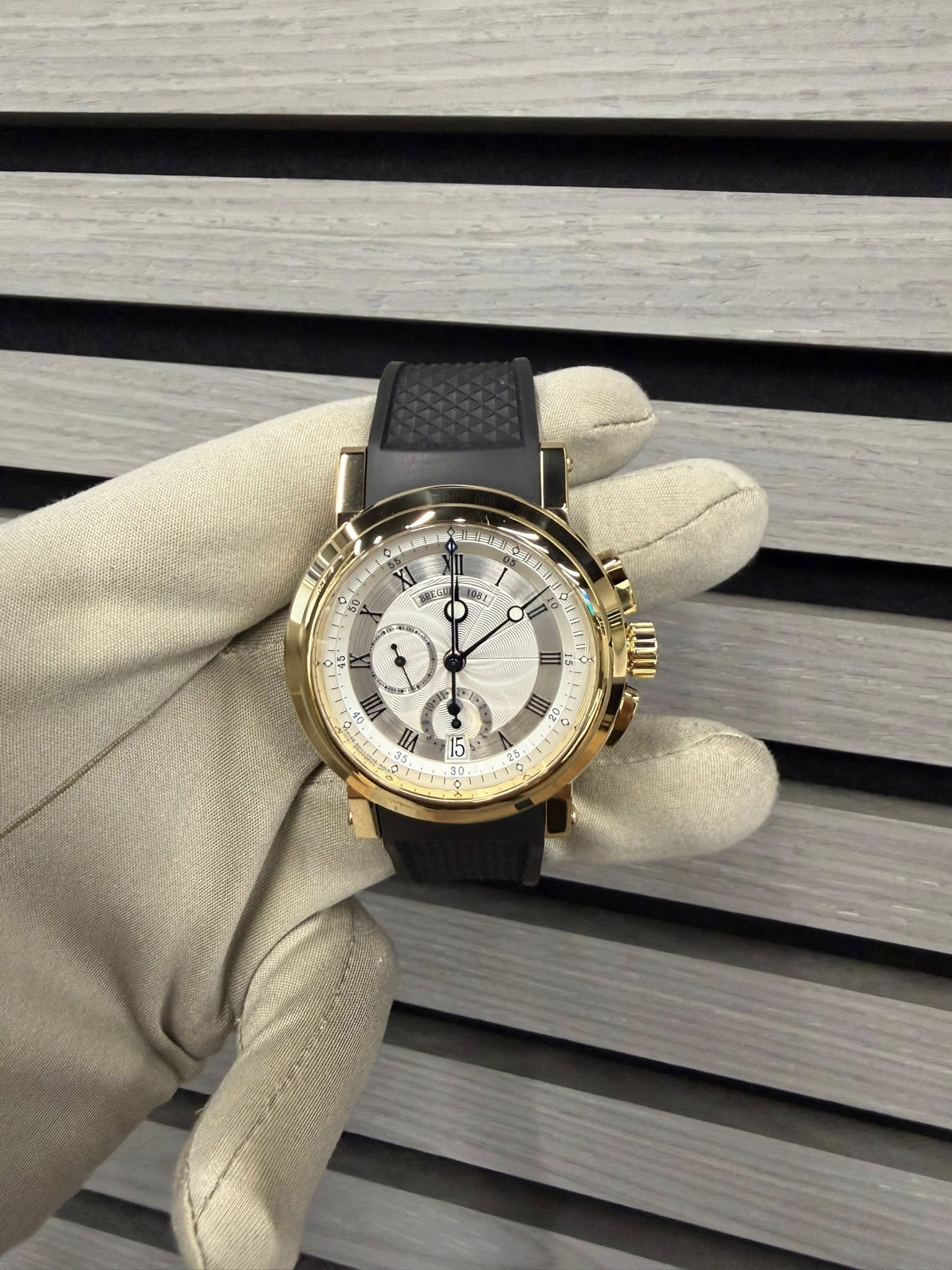 May be an image of wrist watch and text