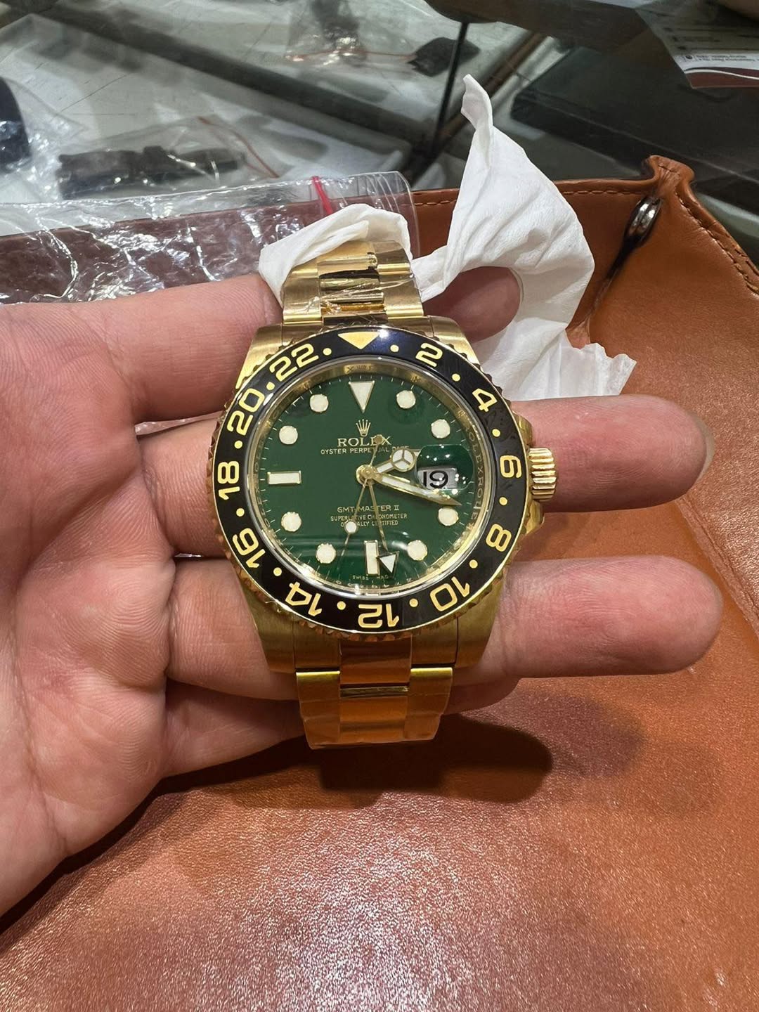 May be an image of wrist watch and text that says ' ROLEX PERPES 22 20 ROL 18 19 6 สาาชจ) ! 12'