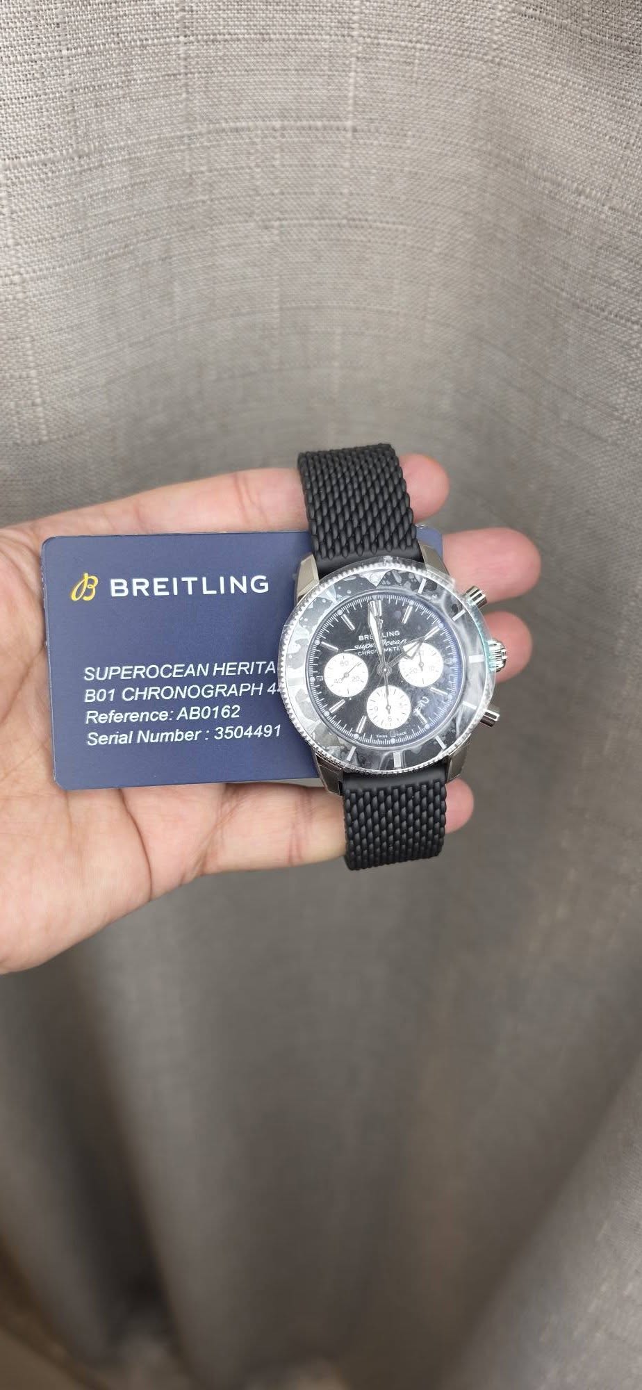 May be an image of digital watch and text that says 'BREITLING ្ុ Ha Aoa SUPEROCEANHERITA HERITA B01 CHRONOGRAPH 4- Reference: Reference:AB0162 :AB0162 Serial Number 3504491 ብት 0'