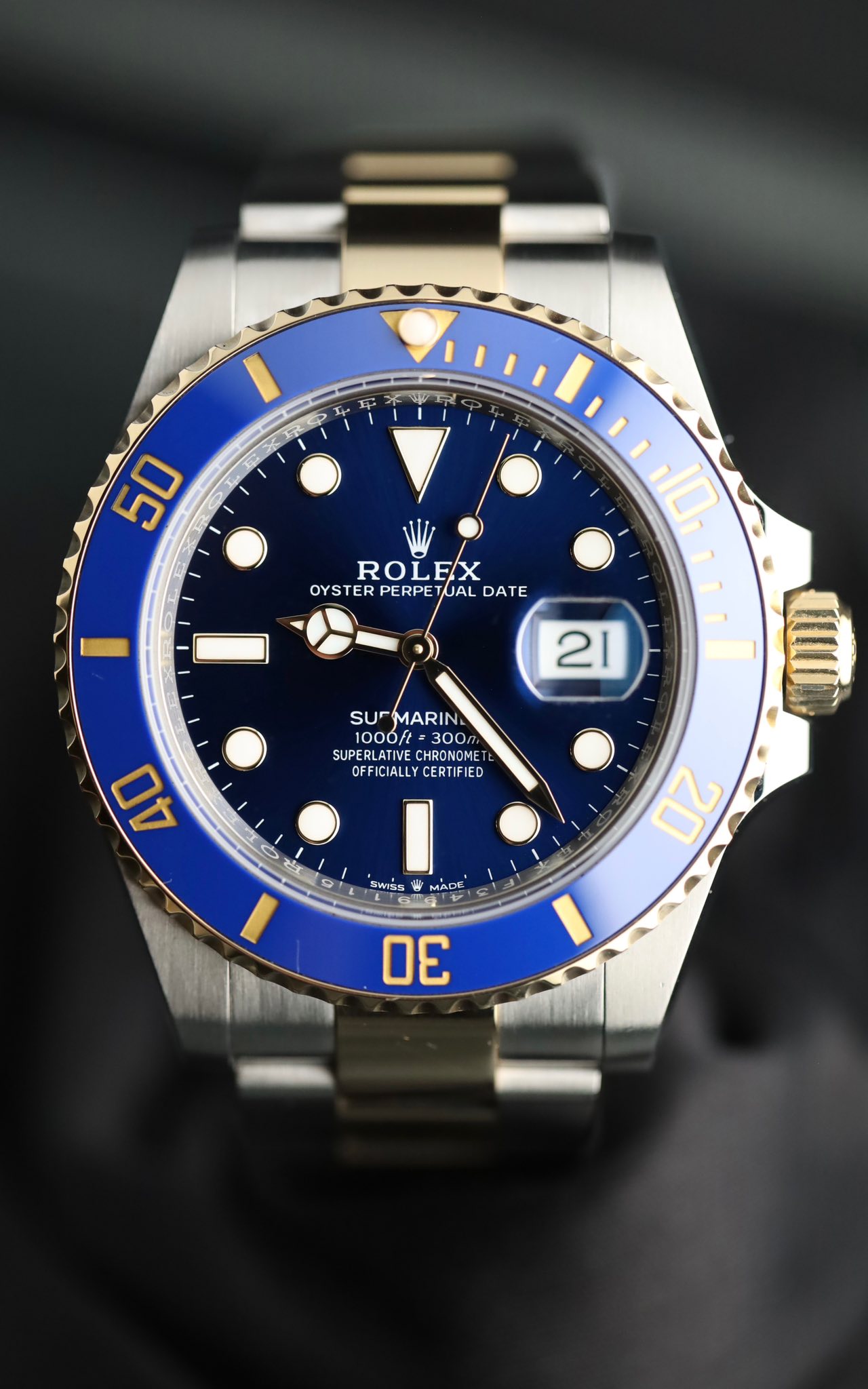 May be an image of wrist watch and text that says '50 ROLEX OYSTER PERPE OYSTERPERPETUALDATE UAL DATE 10. 21 SUMARIN MARIN Sur 1000f 300 300 SUPERLATIVE SUPER…