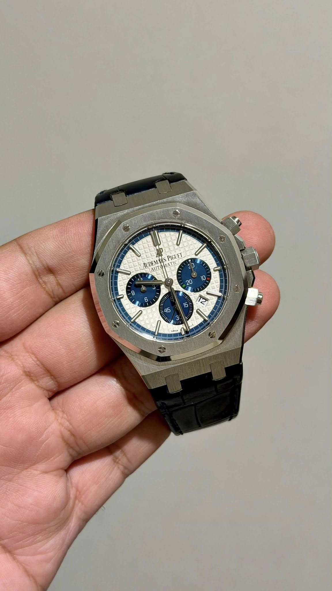 May be an image of digital watch and text
