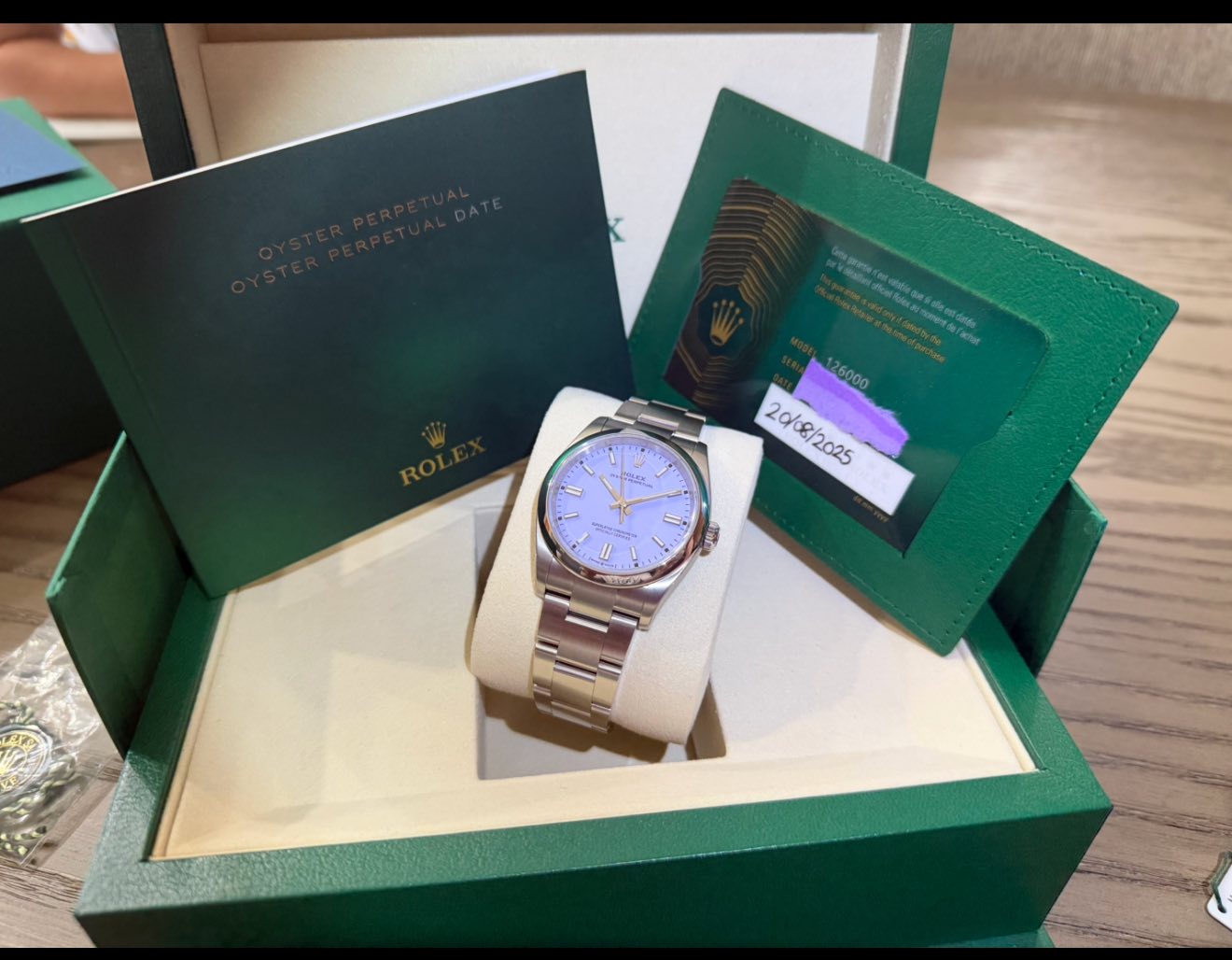 May be an image of wrist watch and text