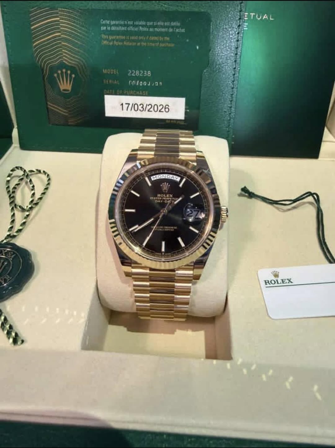 May be an image of wrist watch and text