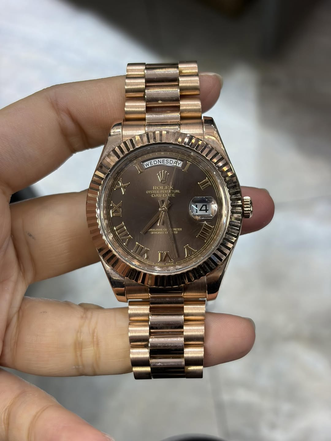 May be an image of wrist watch and text