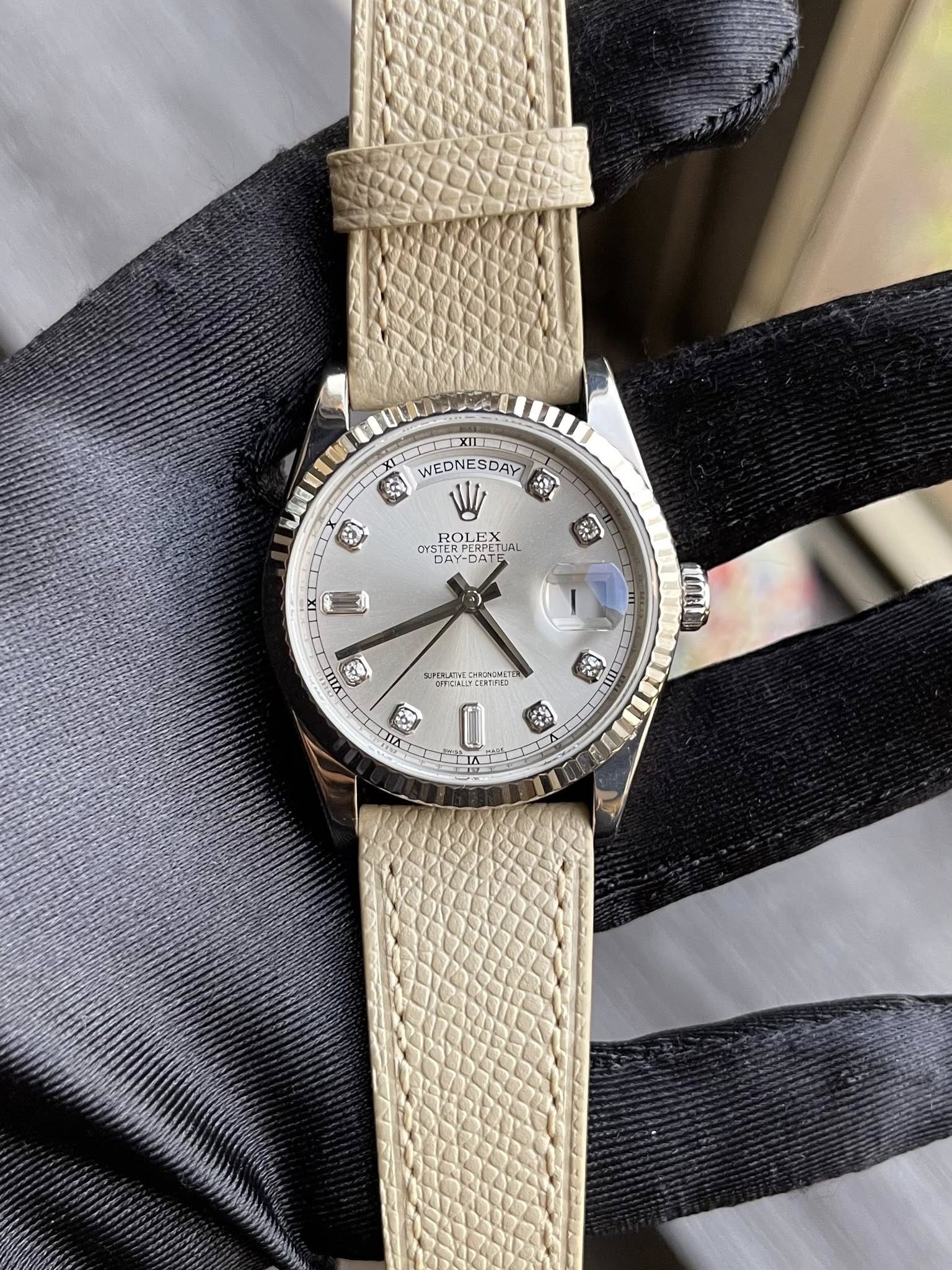 May be an image of wrist watch and text