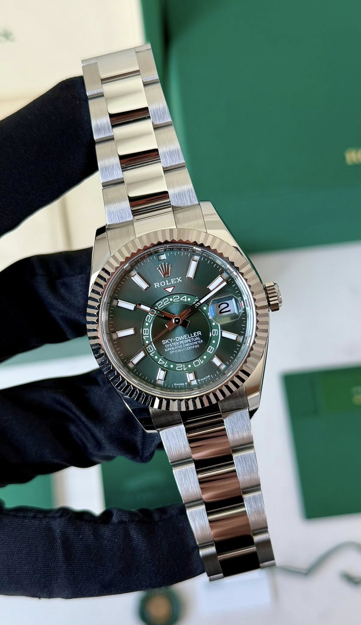 May be an image of wrist watch and text
