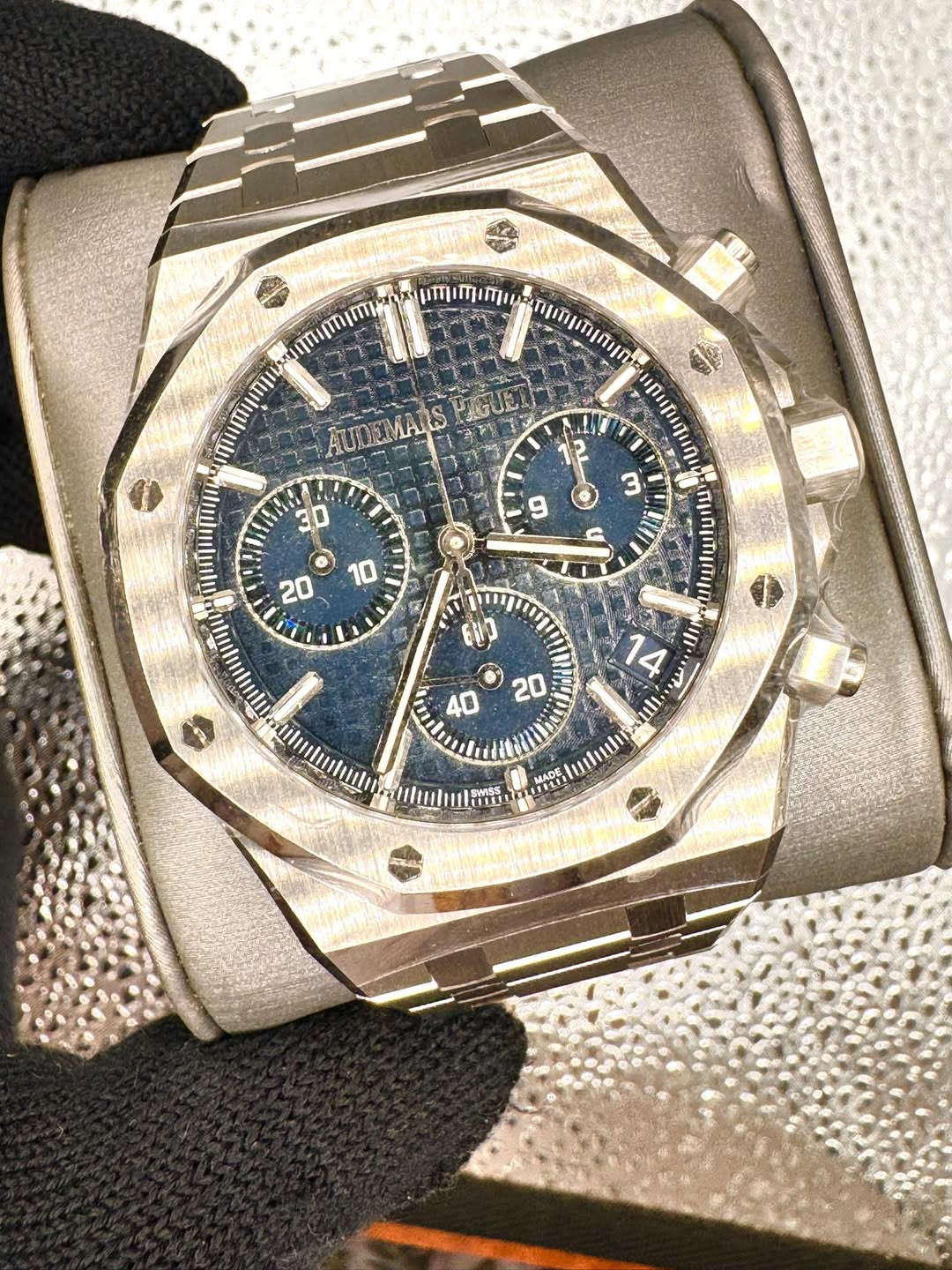 May be an image of wrist watch and text