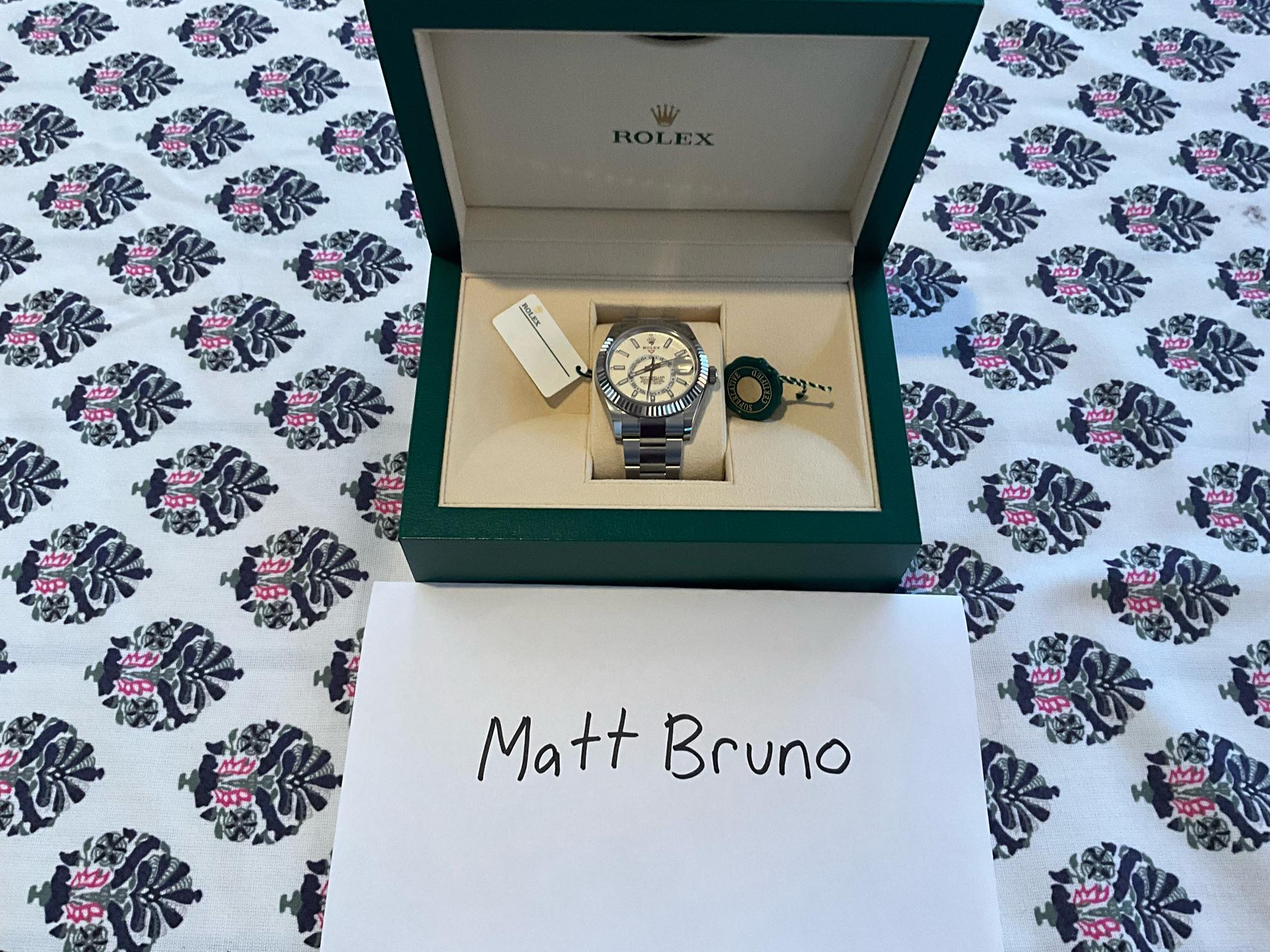 May be an image of wrist watch and text