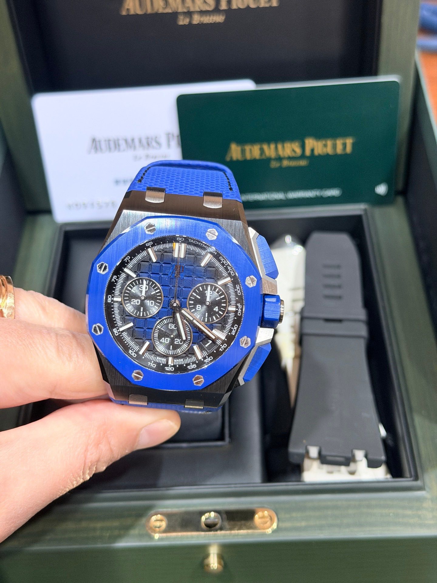 May be an image of wrist watch and text