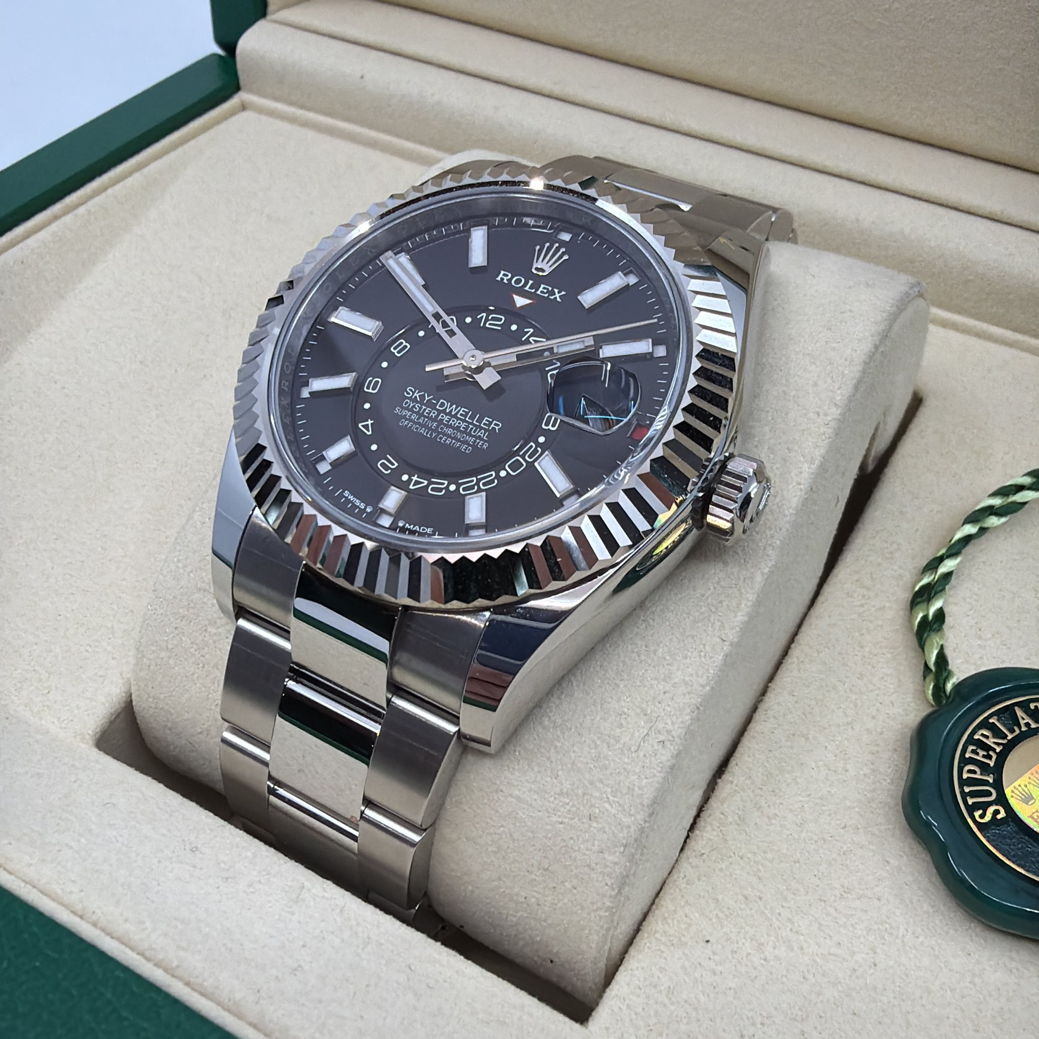May be an image of wrist watch and text