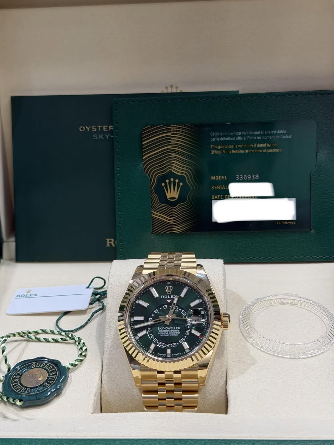 May be an image of wrist watch and text