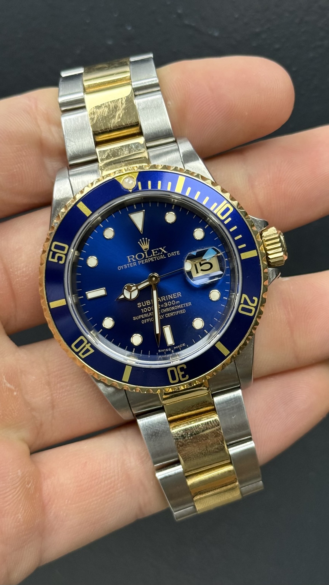 May be an image of wrist watch and text that says '10 50 OYSTERPERPETUALDATE OYSTER ROLEX ATE OYSTERPERP 15 15 INER SUB 100 MST SOMMETE TER 300m 300m 100 HROB AROROMETI EGRLAT…