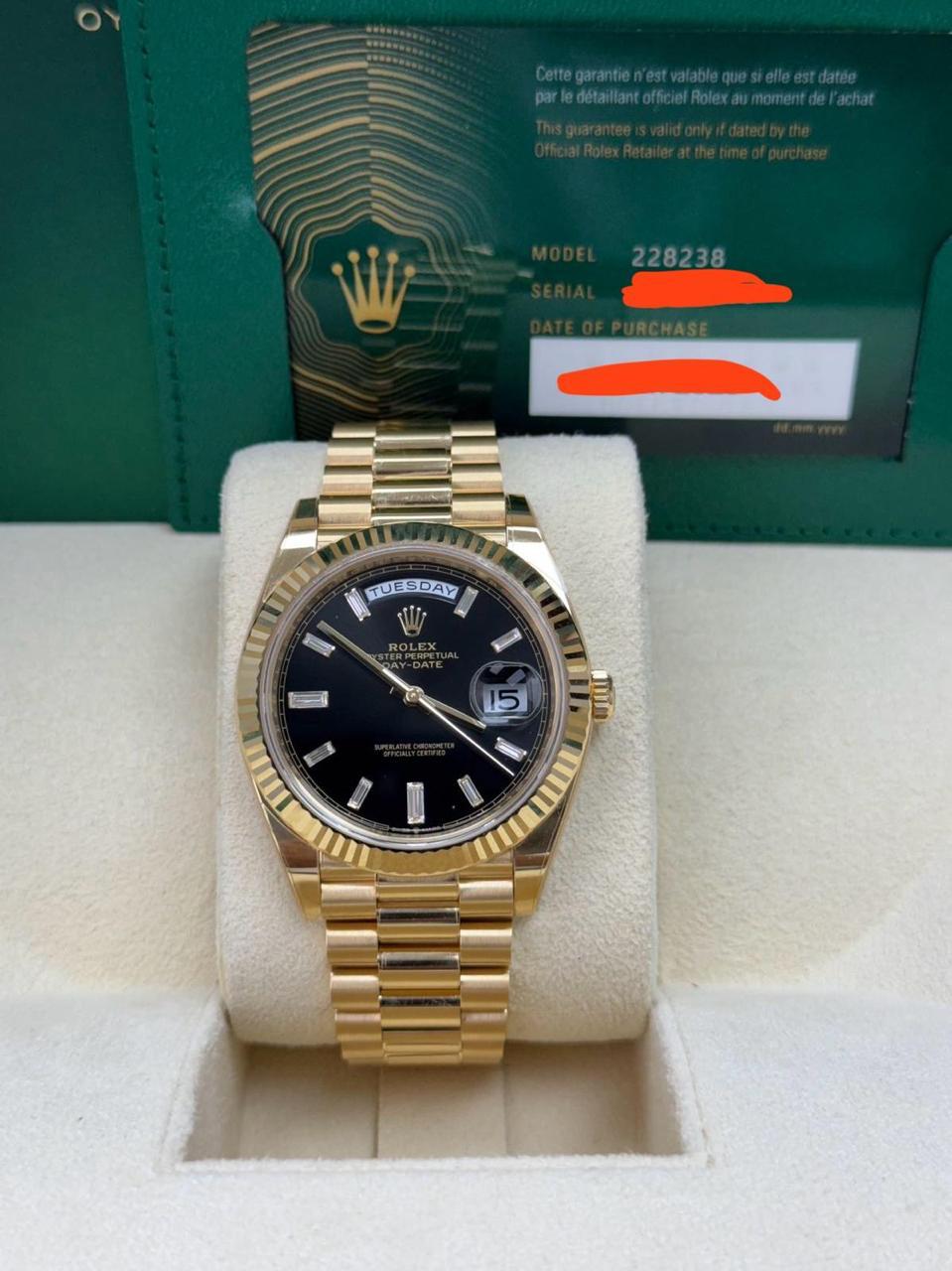 May be an image of wrist watch and text