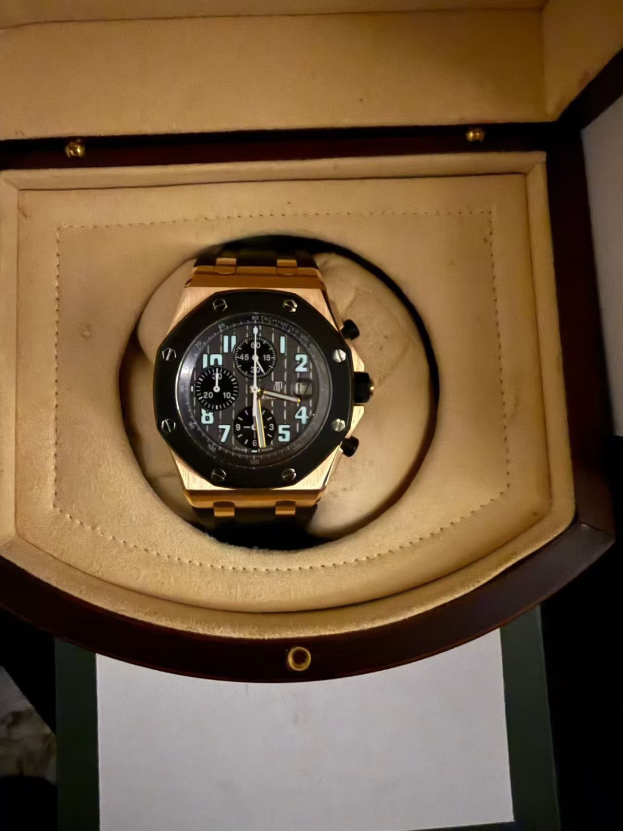 May be an image of wrist watch and text