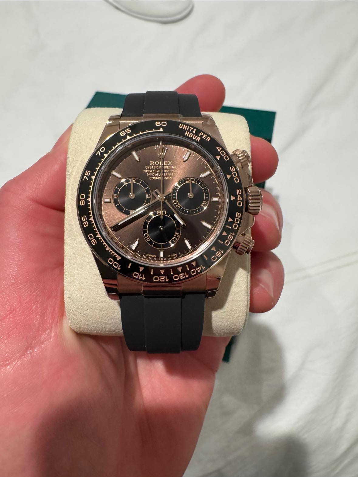 May be an image of wrist watch and text