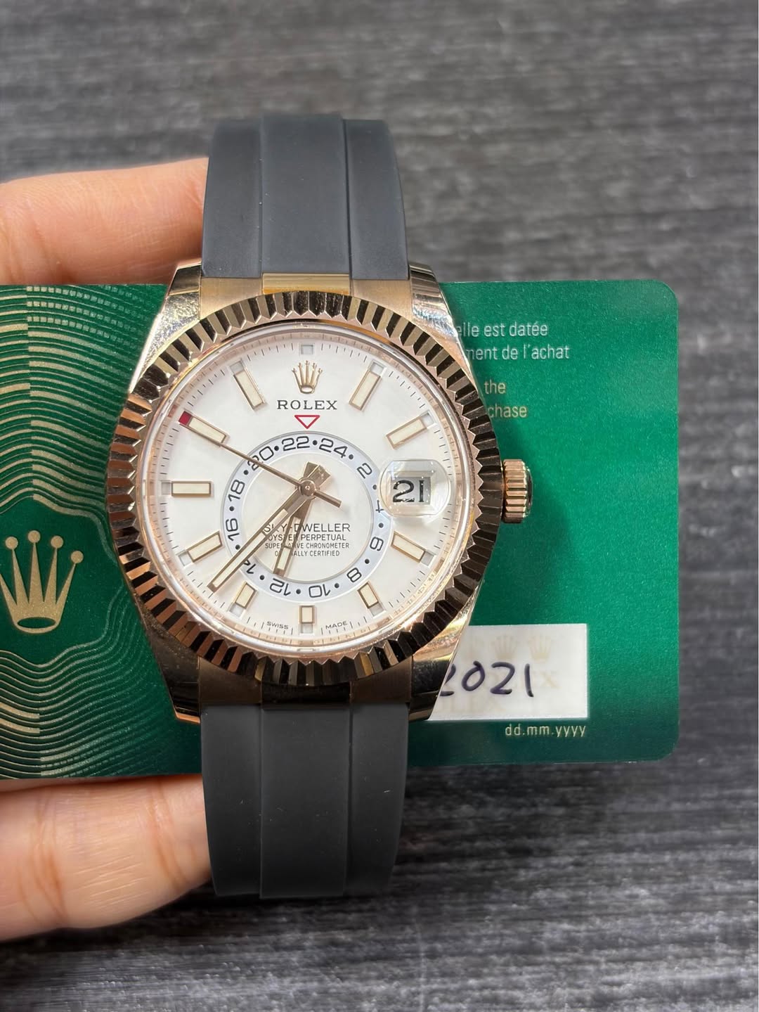 May be an image of wrist watch and text