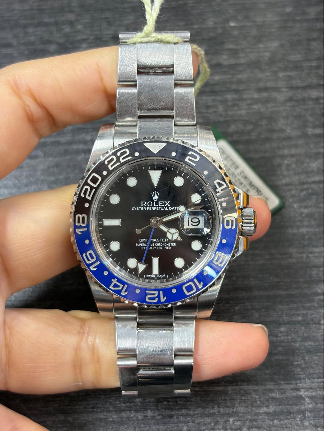 May be an image of wrist watch and text